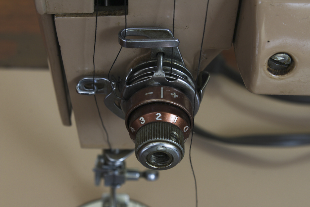 Art Deco Era Sewing Machine Table with a Pink Singer 401 A Machine