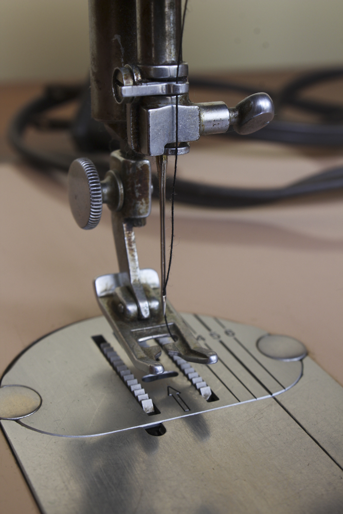 Art Deco Era Sewing Machine Table with a Pink Singer 401 A Machine