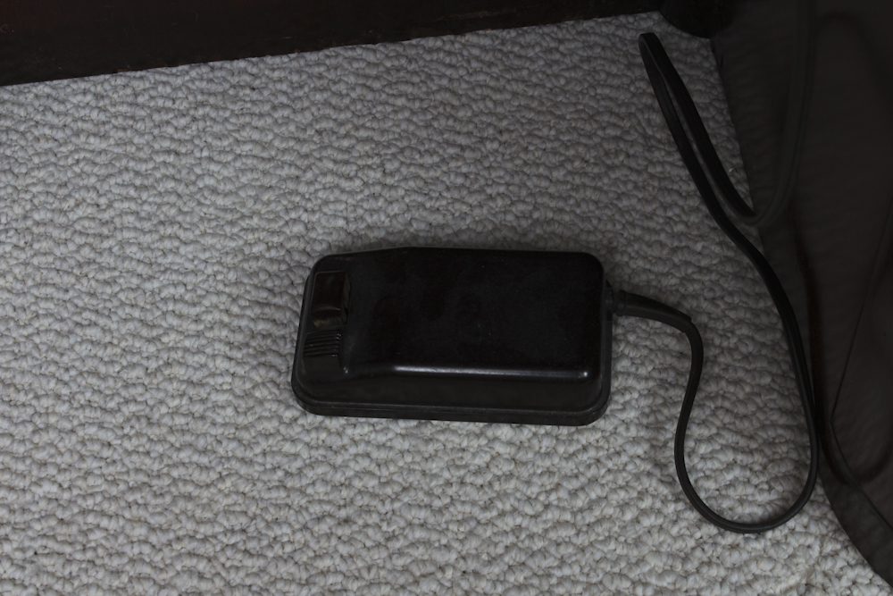 Art Deco Era Sewing Machine Table with a Pink Singer 401 A Machine