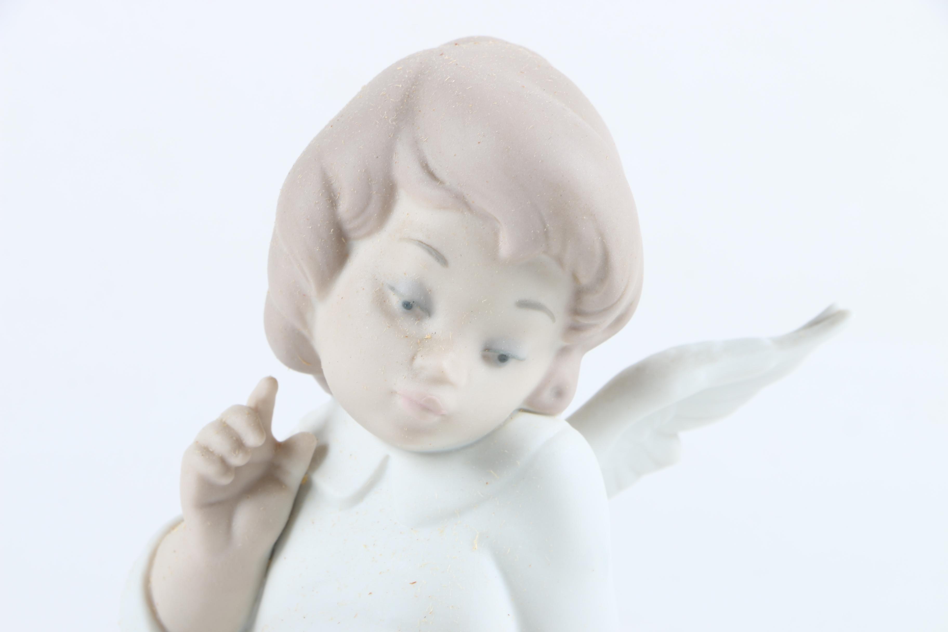 Lladró "Angel Wondering" Ceramic Figurine