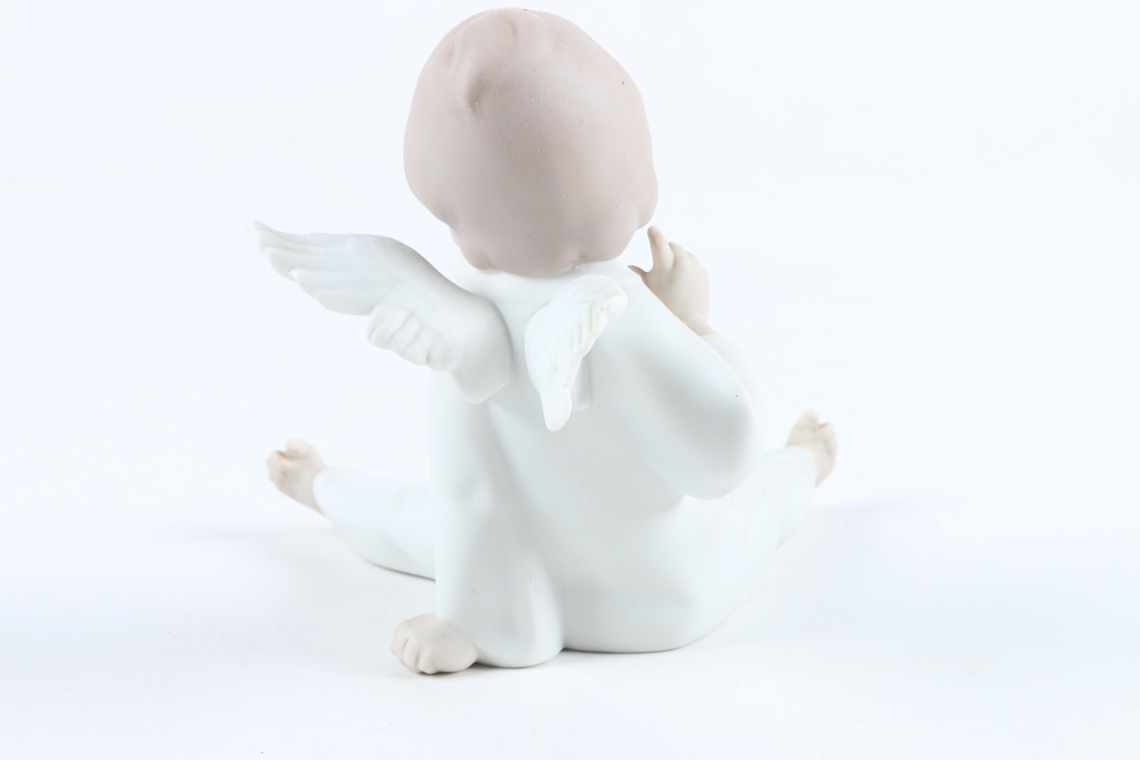 Lladró "Angel Wondering" Ceramic Figurine