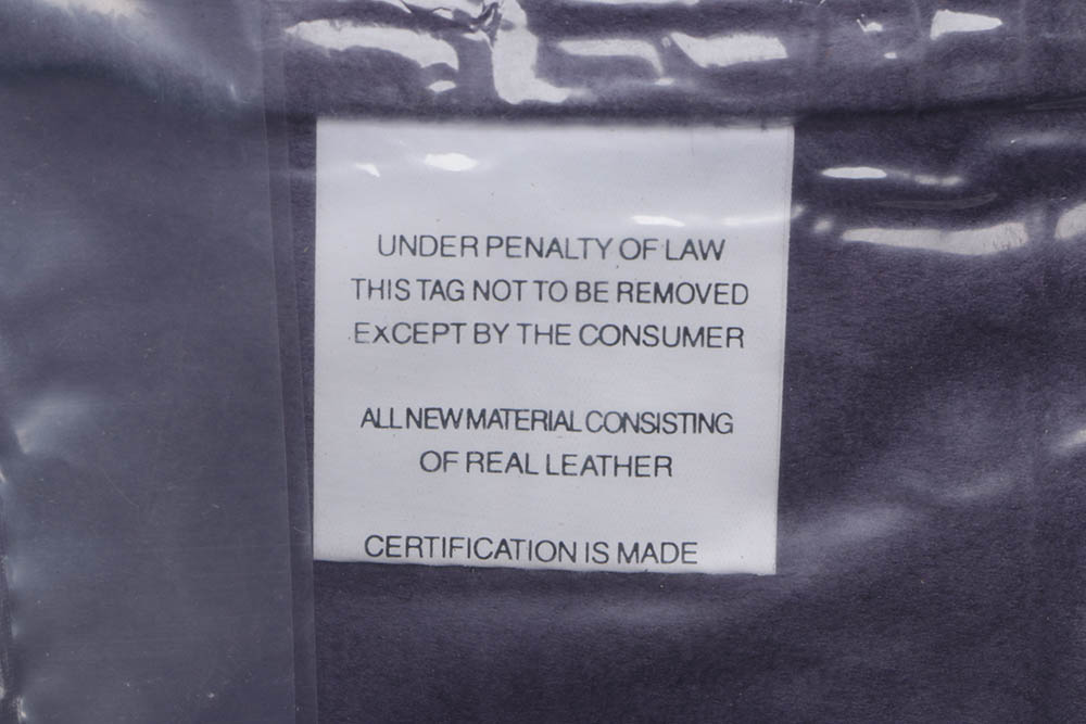 Five Flambro Imports Purple Leather Pillows with Weave Motif Panels