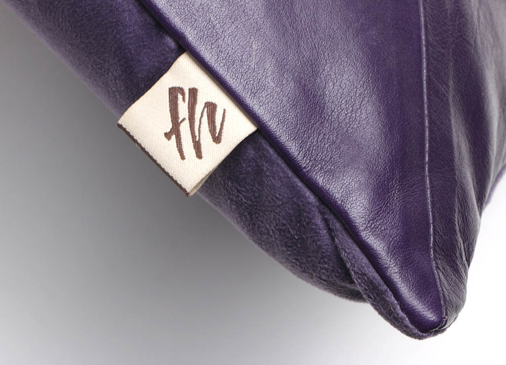 Five Flambro Imports Purple Leather Pillows with Weave Motif Panels