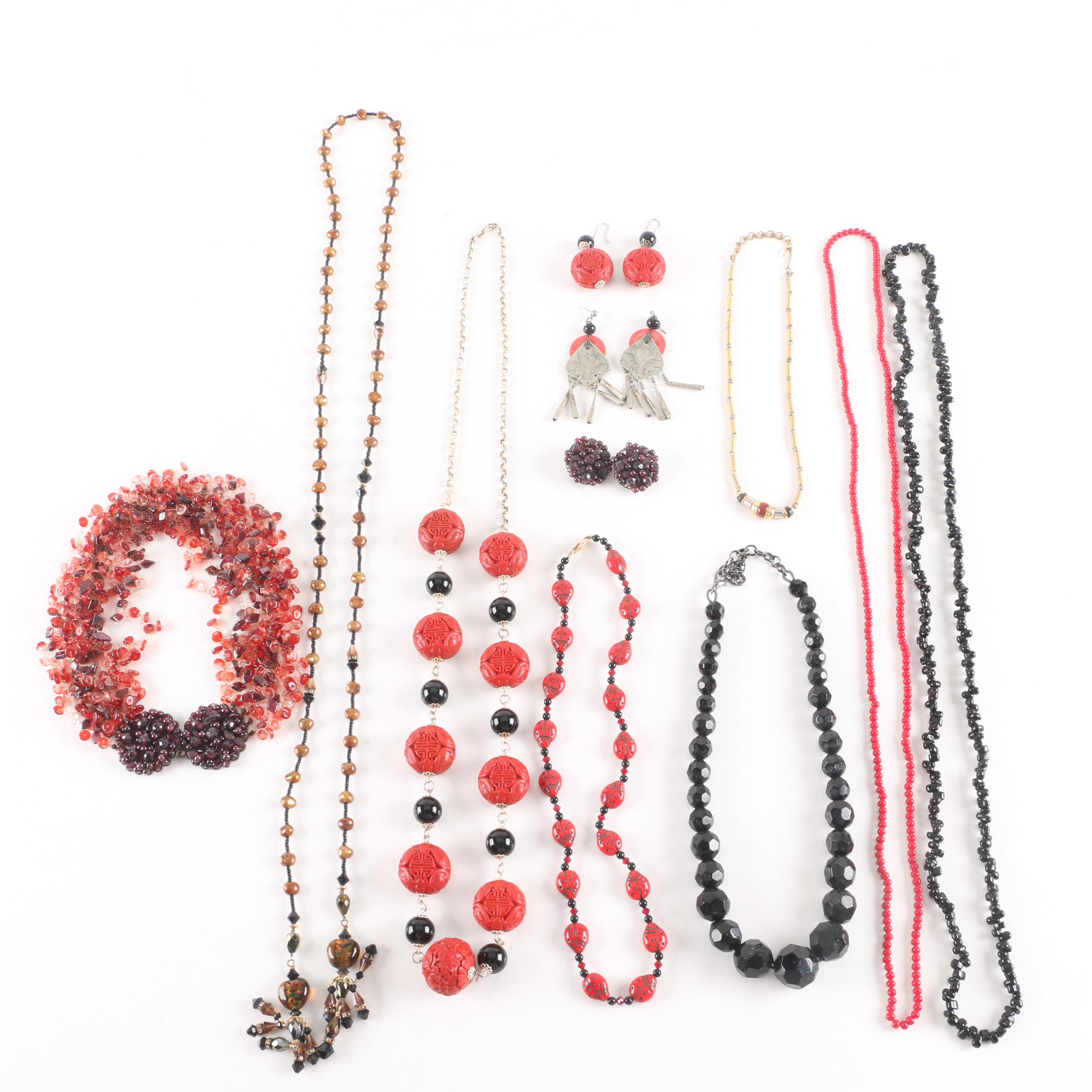 Collection of Necklaces and Earrings Including Cinnabar and Sterling Silver