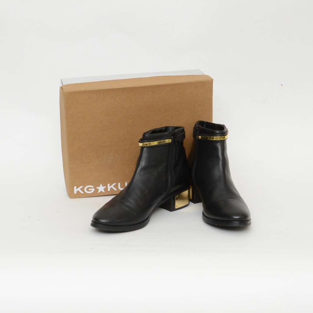 Black boots 2024 with gold accents