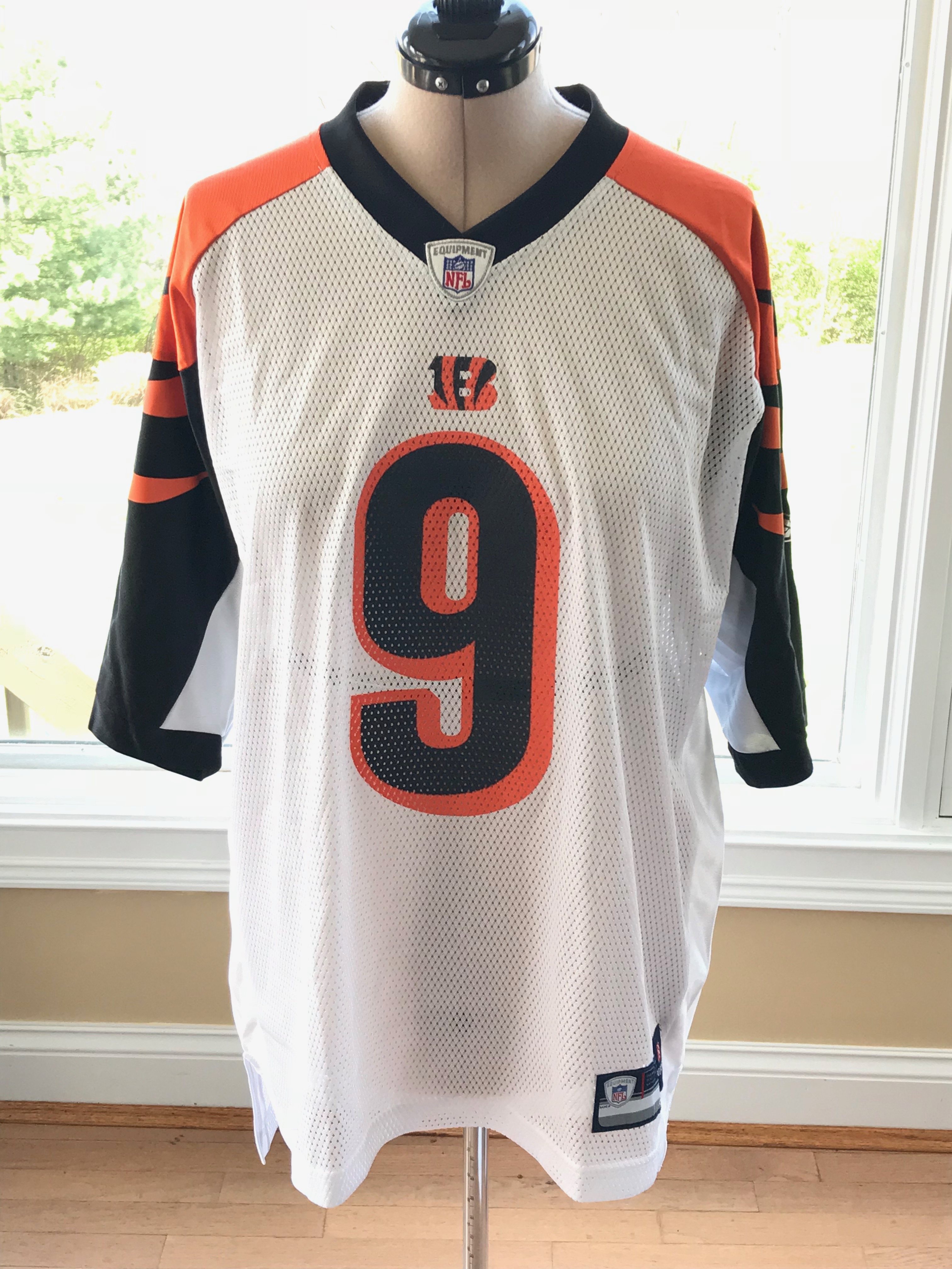 Carson Palmer Signed Football and Unsigned Bengals Jersey