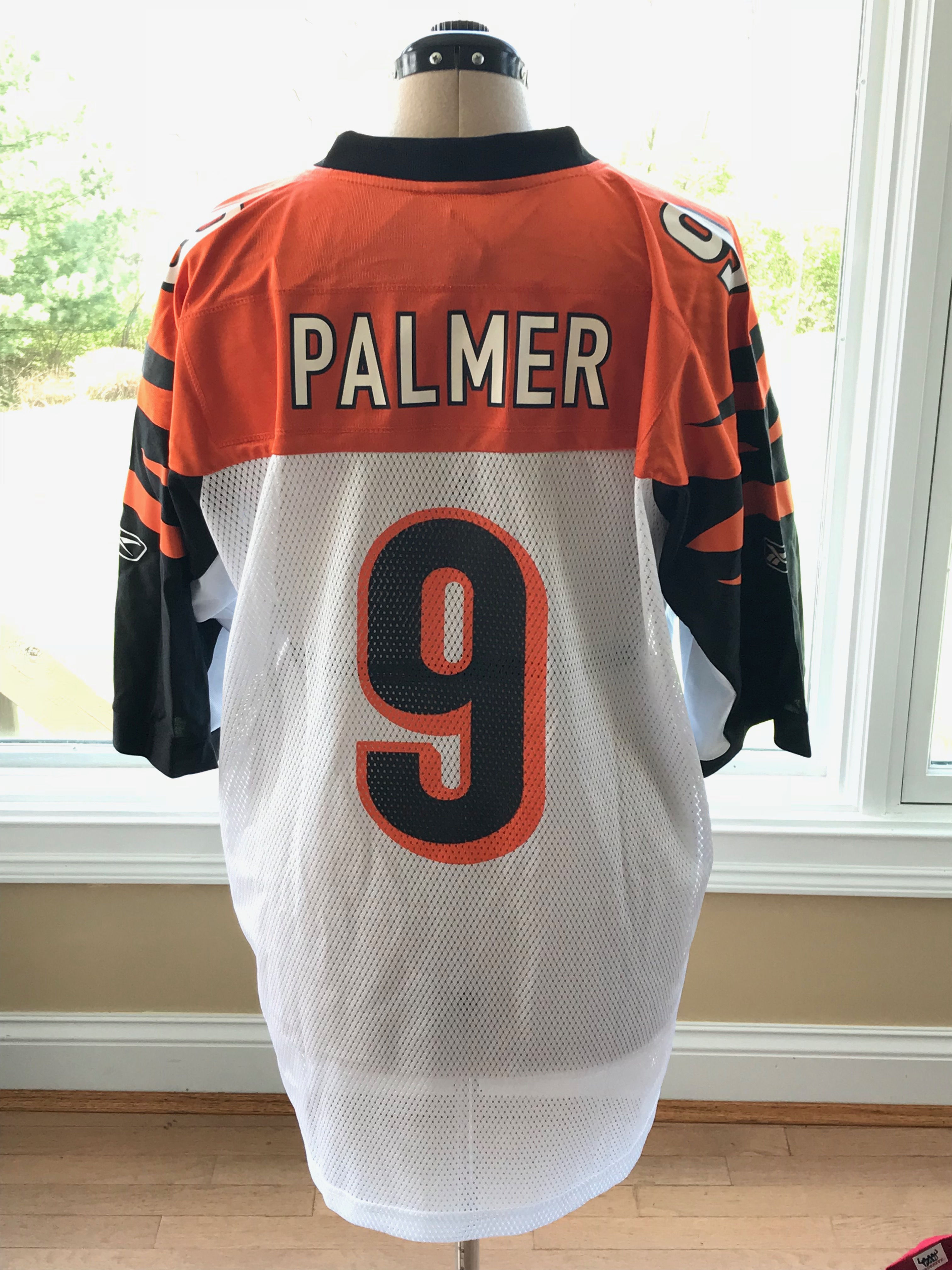 Carson Palmer Signed Football and Unsigned Bengals Jersey
