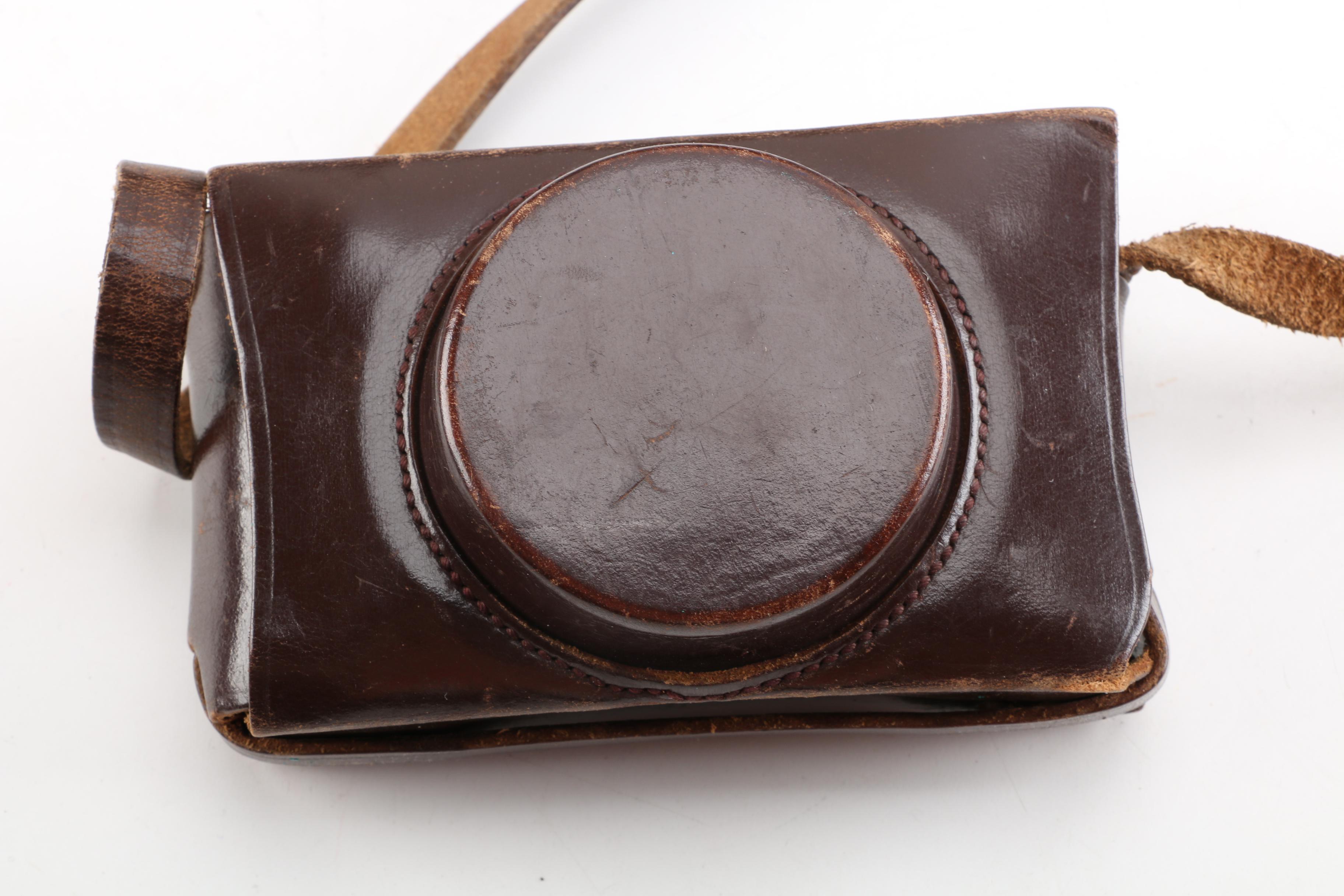 Rollieflex TLR Automat MX Camera, Argus 35mm Camera, and Slide Box