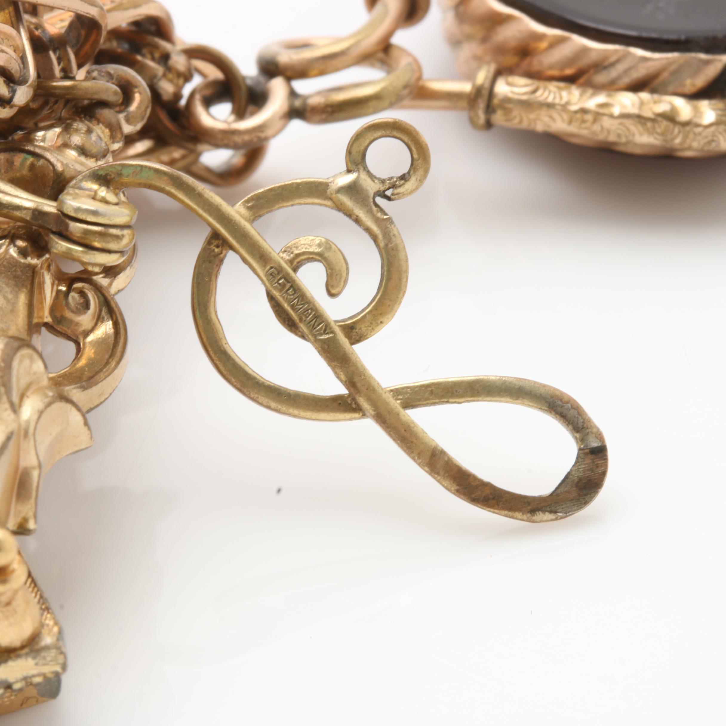 Vintage Gold Tone Charm Bracelet Featuring Black Onyx Intaglio