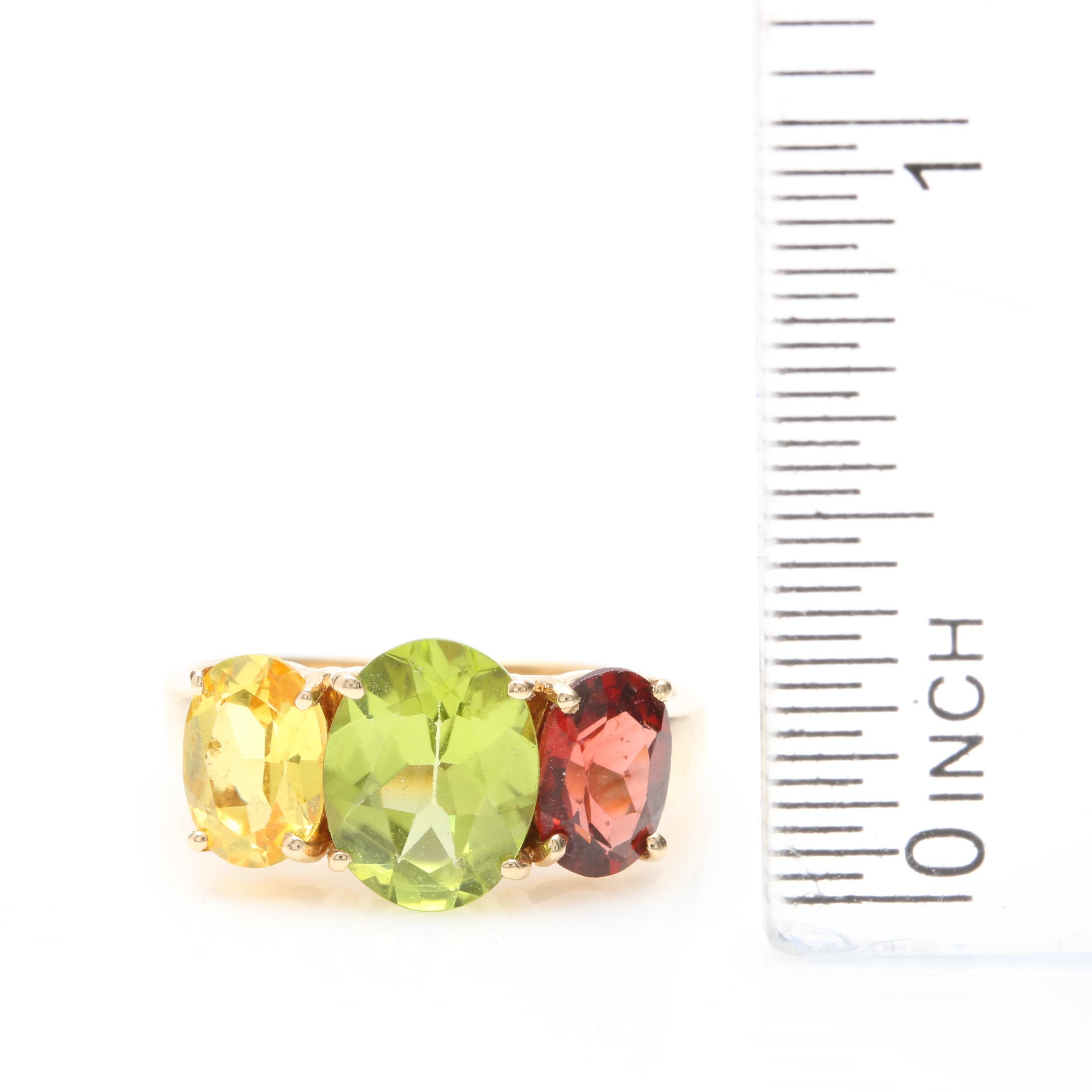 14K Yellow Gold Peridot, Garnet, and Synthetic Yellow Sapphire Ring