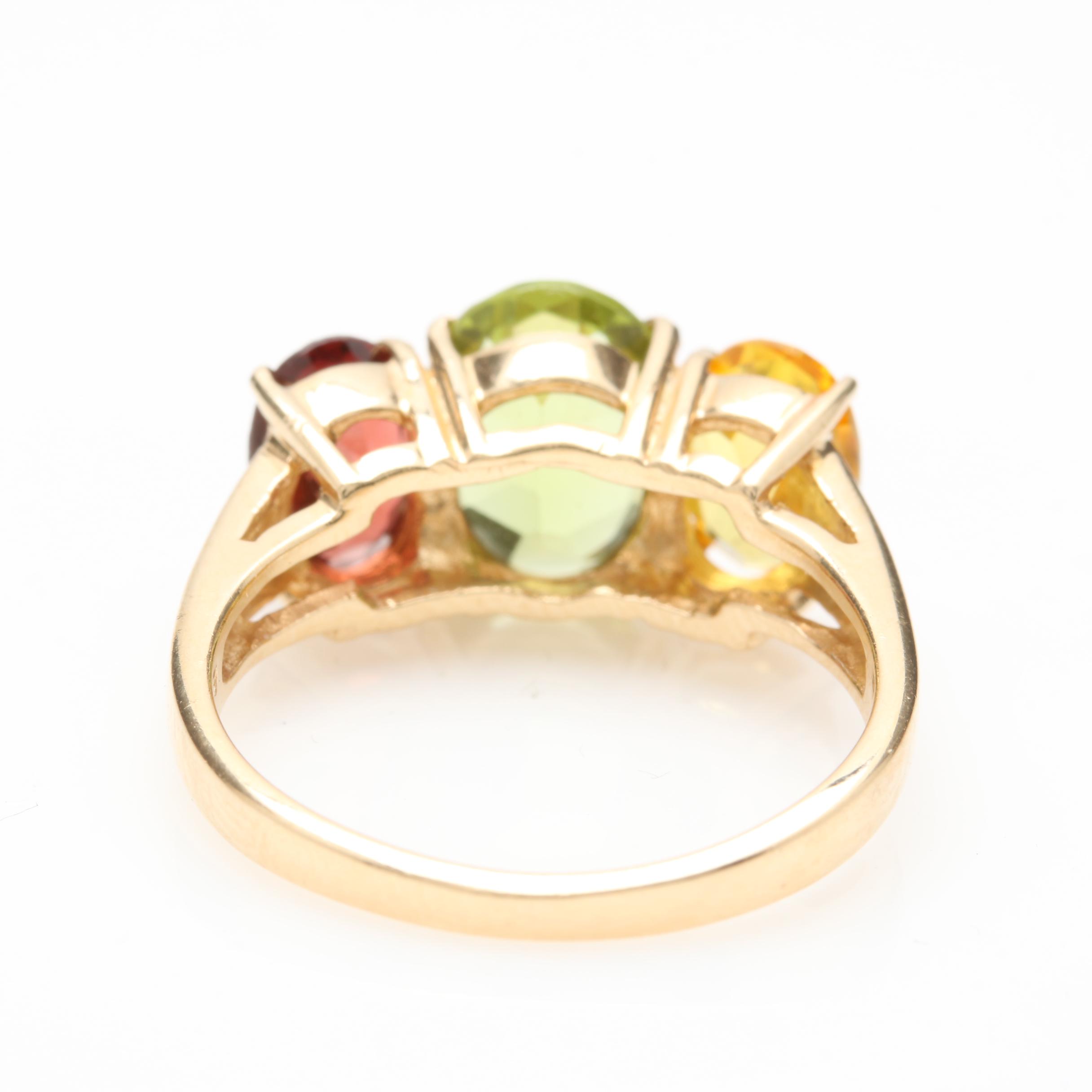 14K Yellow Gold Peridot, Garnet, and Synthetic Yellow Sapphire Ring