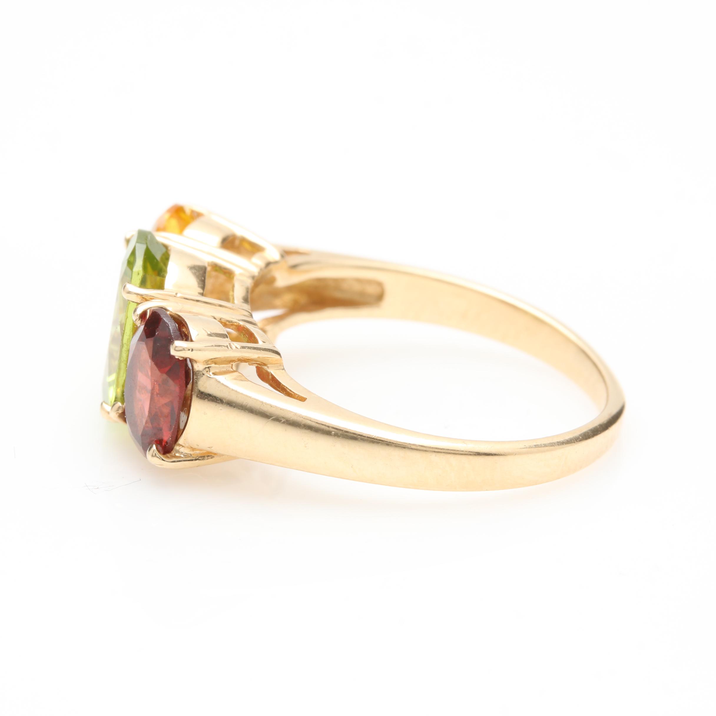 14K Yellow Gold Peridot, Garnet, and Synthetic Yellow Sapphire Ring