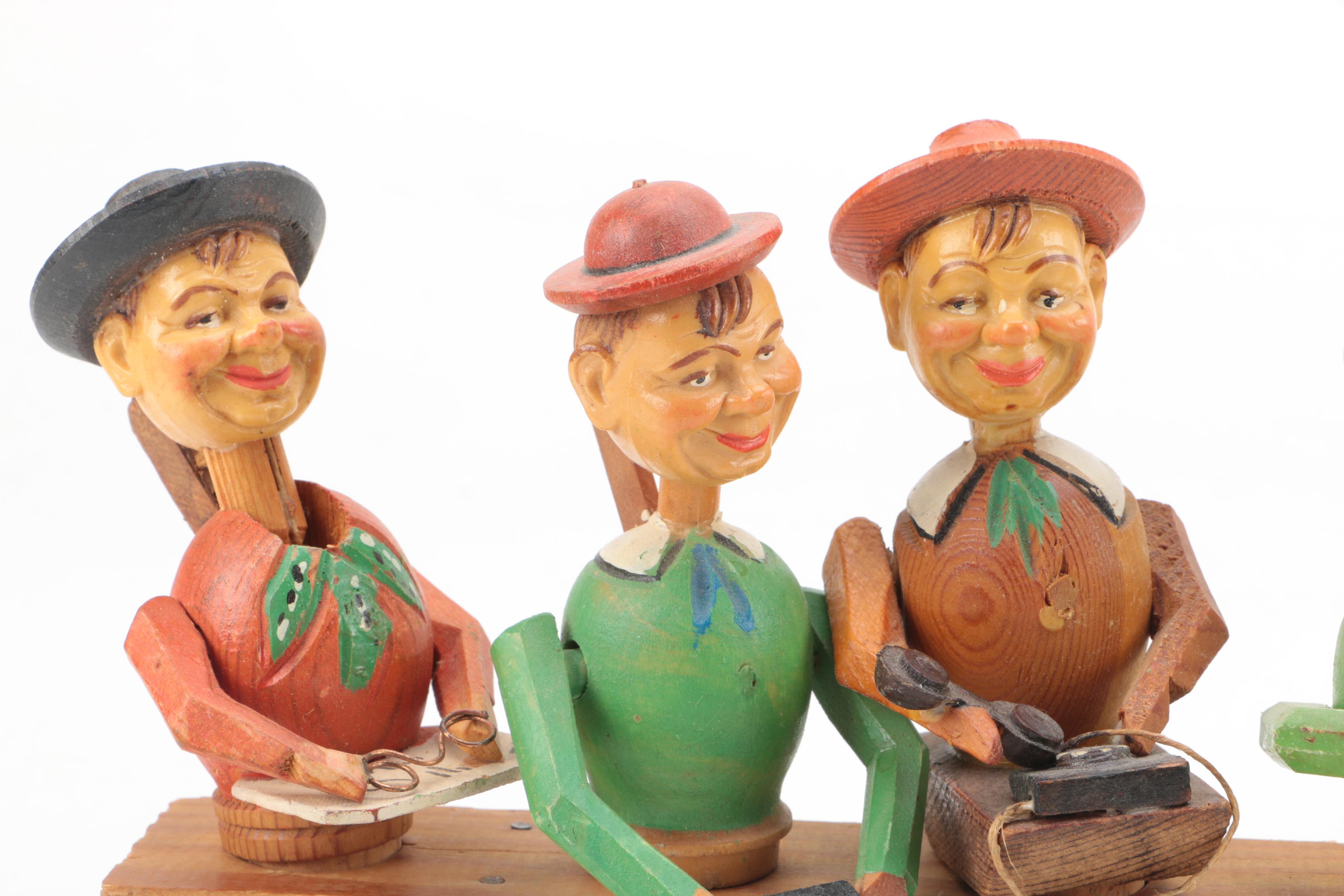 C. 1950s Italian Carved Wooden Articulated Figural Bottle Stoppers In Stand