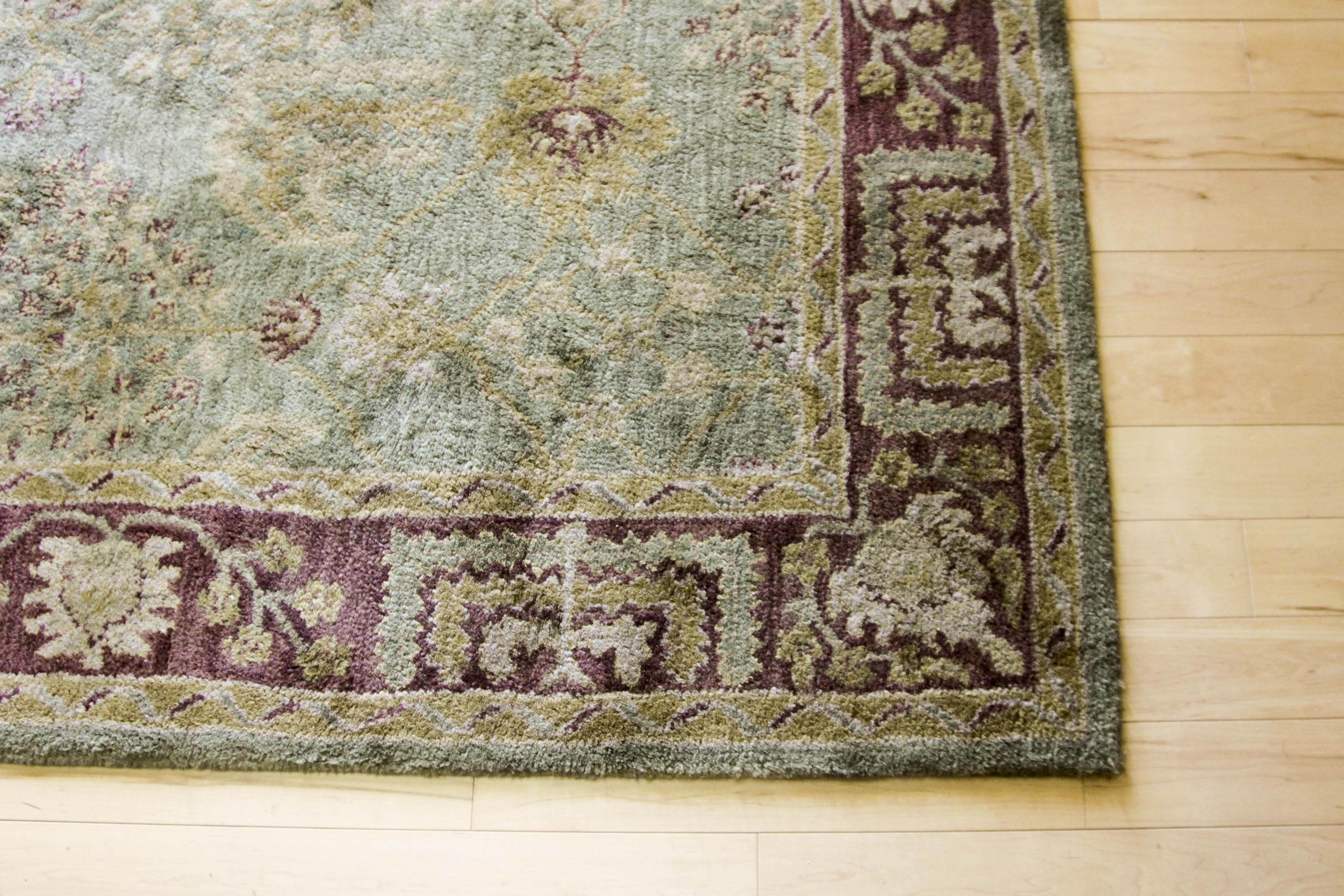 A Hand Tufted Pottery Barn Area Rug