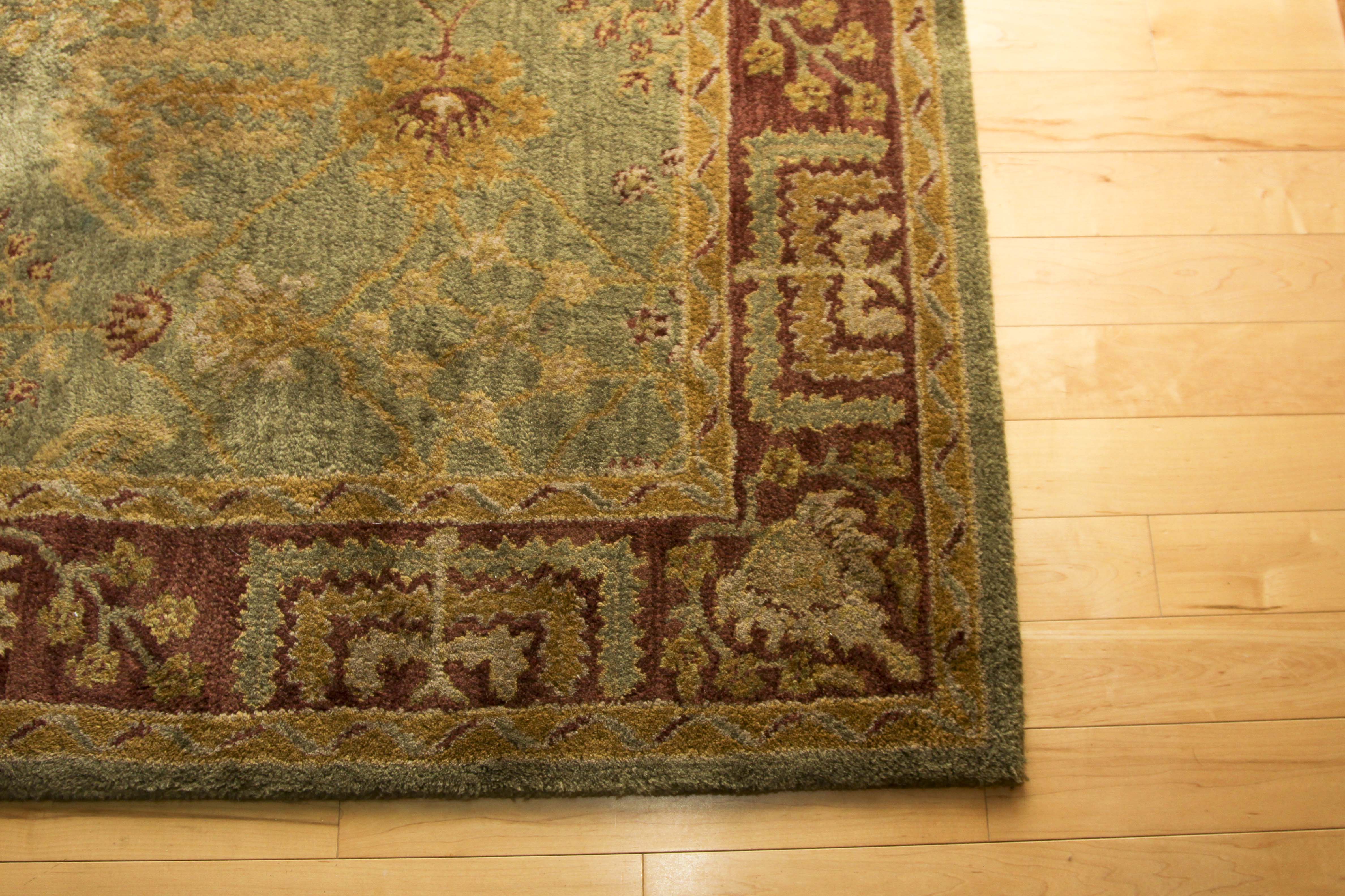 A Hand Tufted Pottery Barn Area Rug