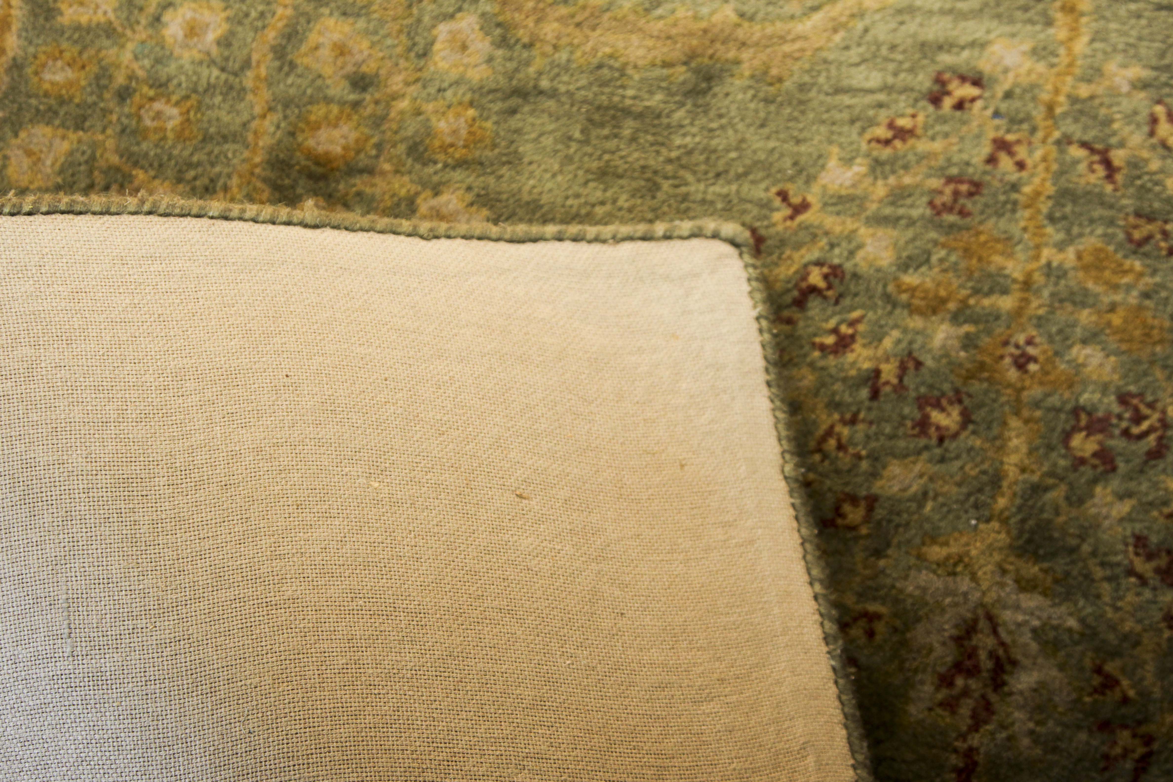 A Hand Tufted Pottery Barn Area Rug