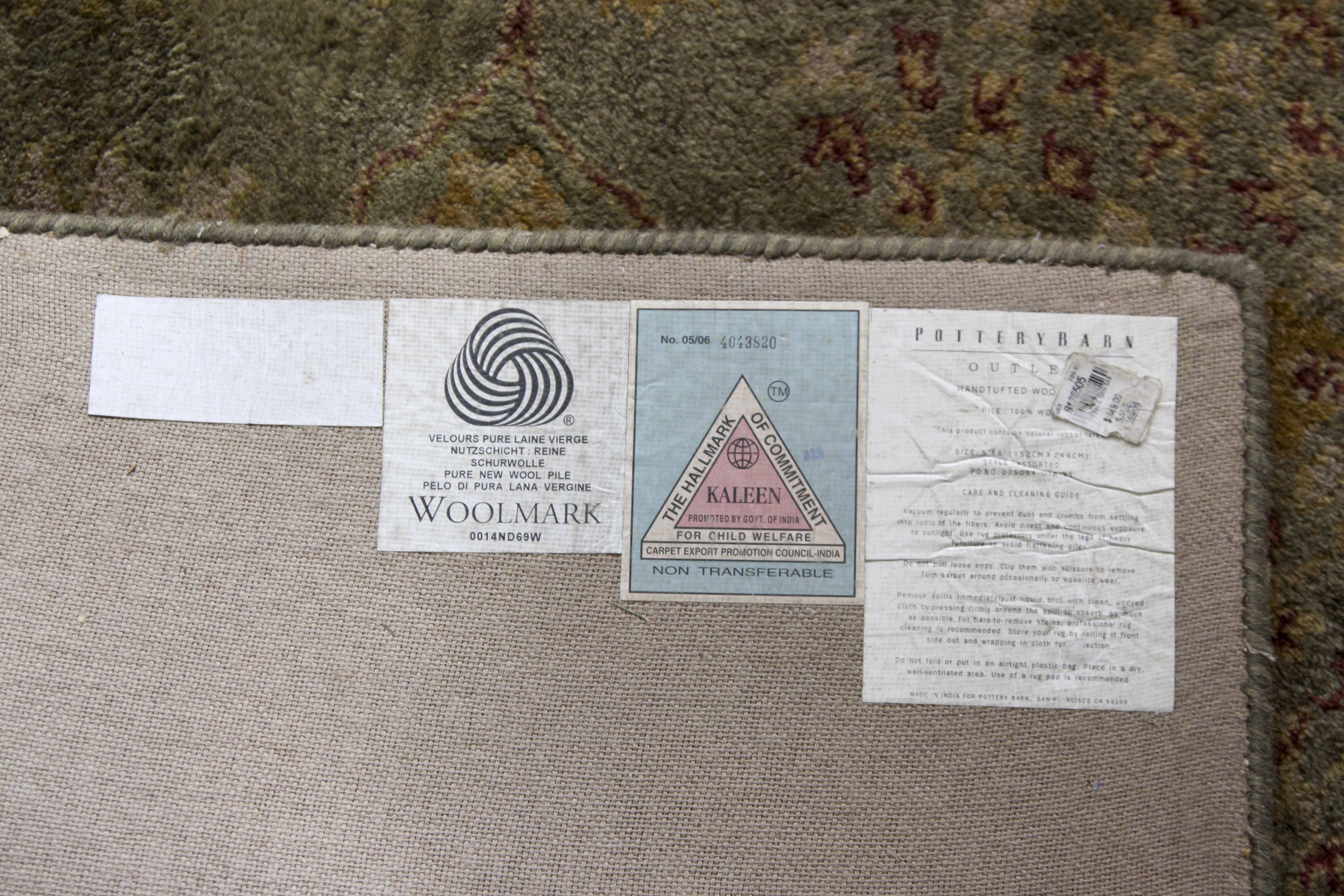 A Hand Tufted Pottery Barn Area Rug