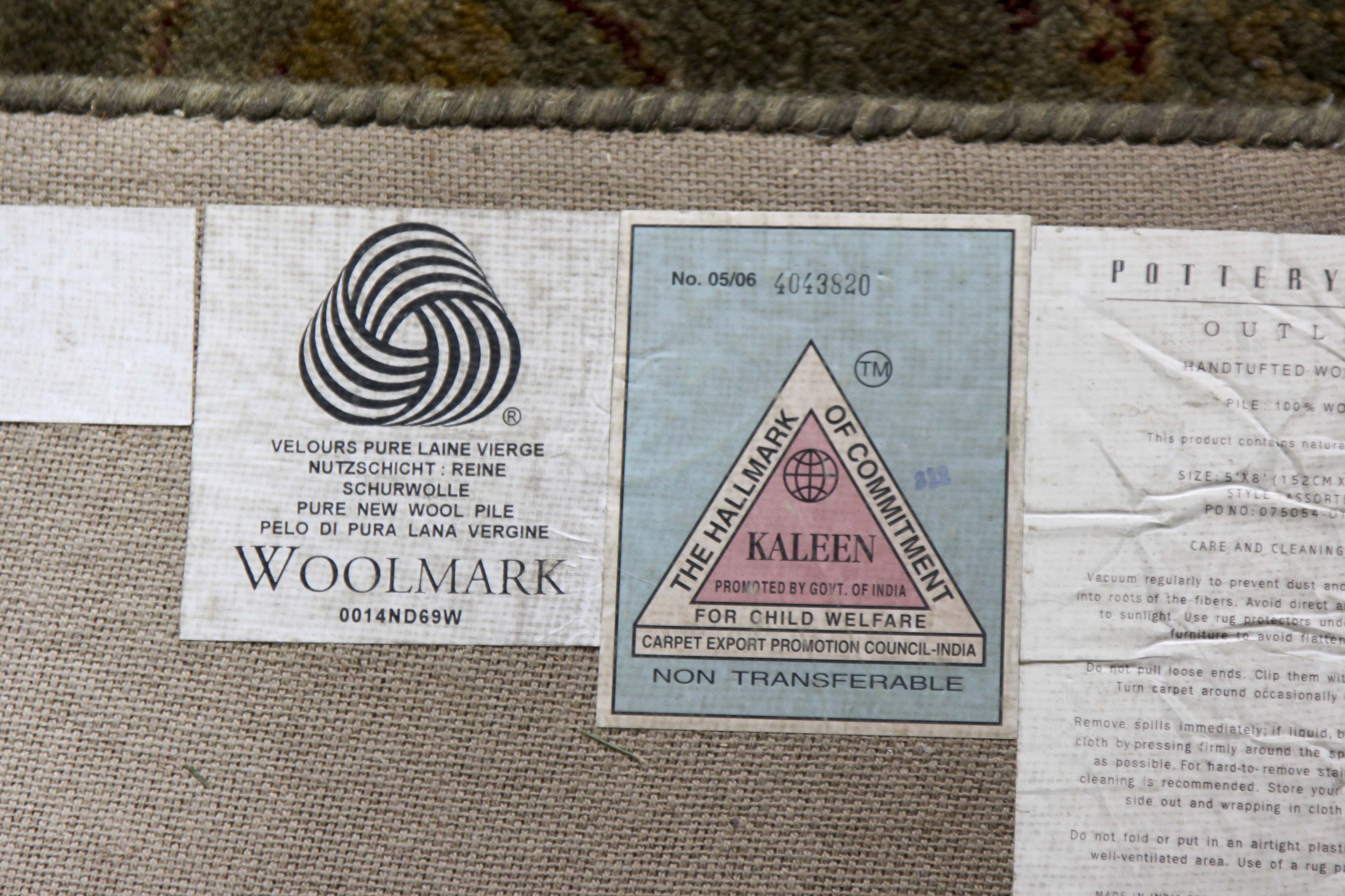 A Hand Tufted Pottery Barn Area Rug