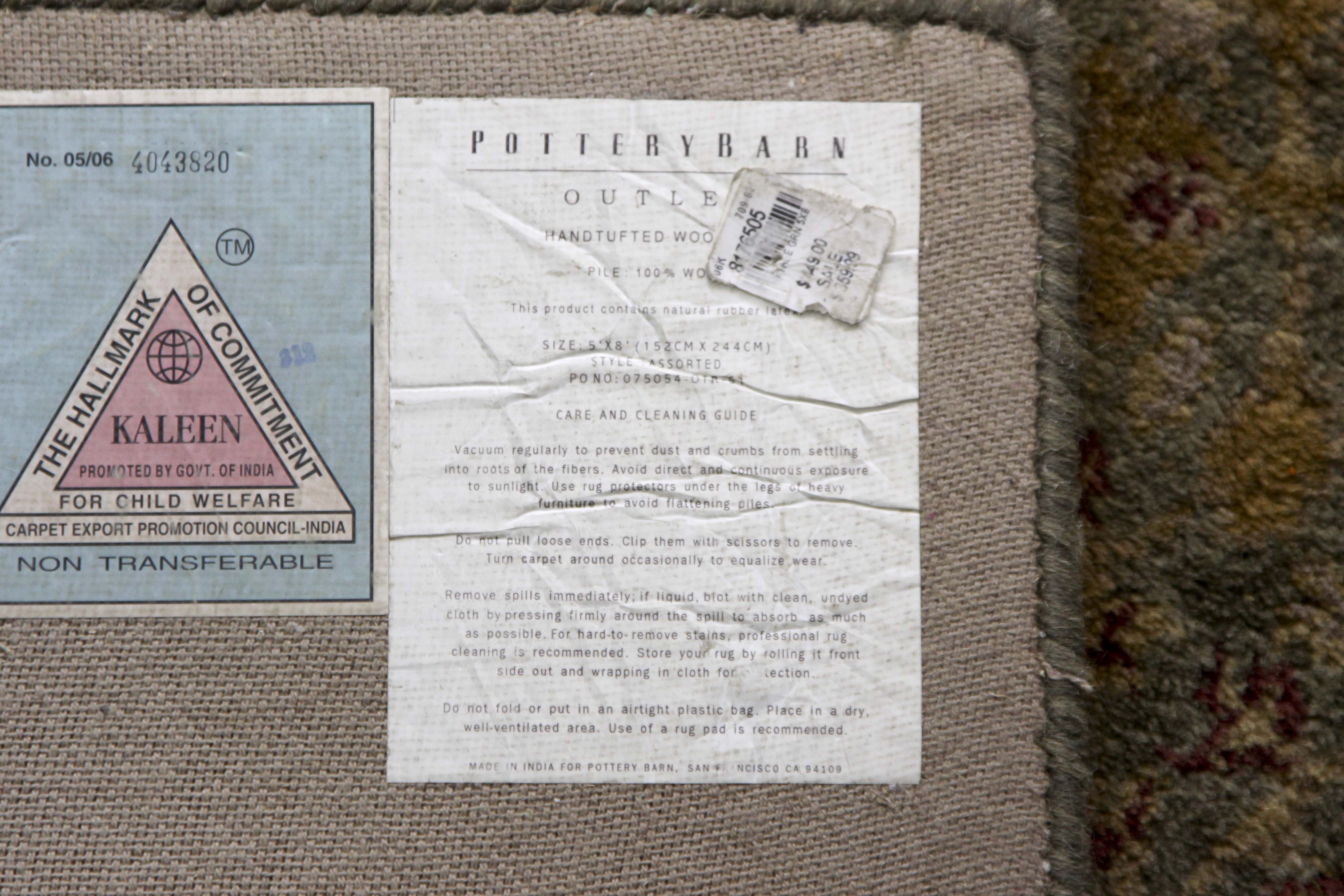 A Hand Tufted Pottery Barn Area Rug