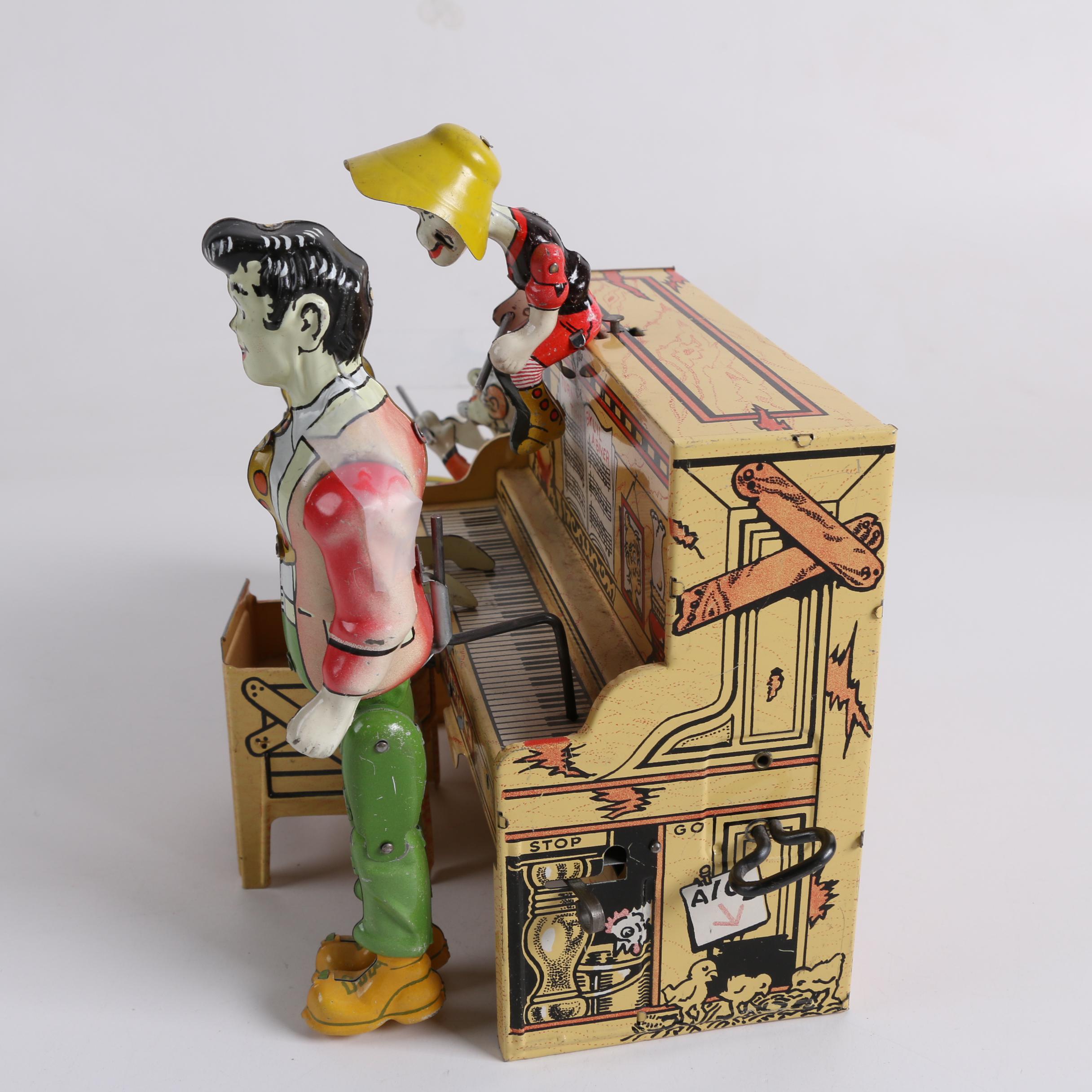 1945 "Li'l Abner" Dogpatch Band Tin Wind-Up Musical Toy by Unique Art Mfg. Co.