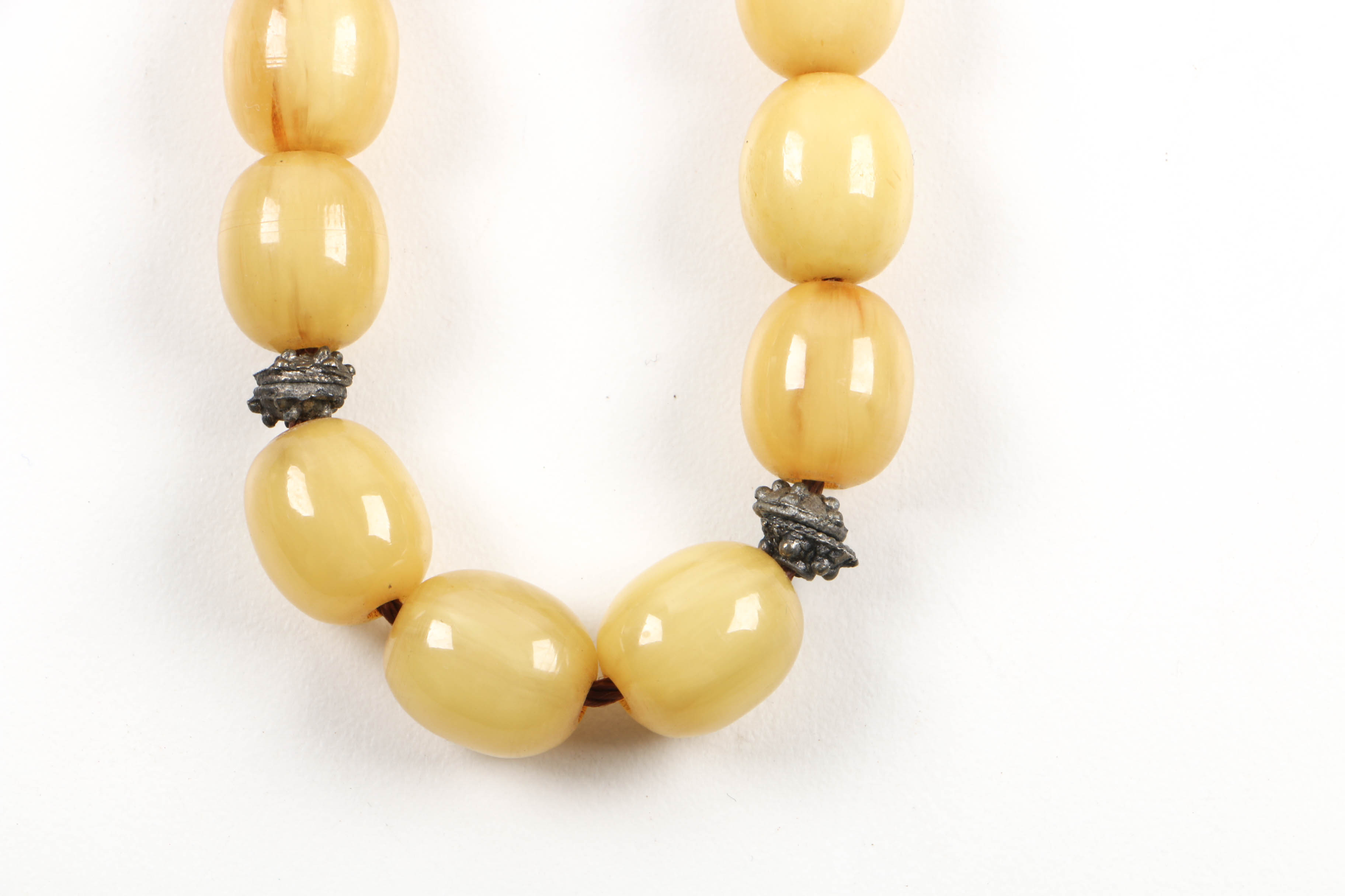 Grouping of Jewelry Including Necklace with Bronze Bull