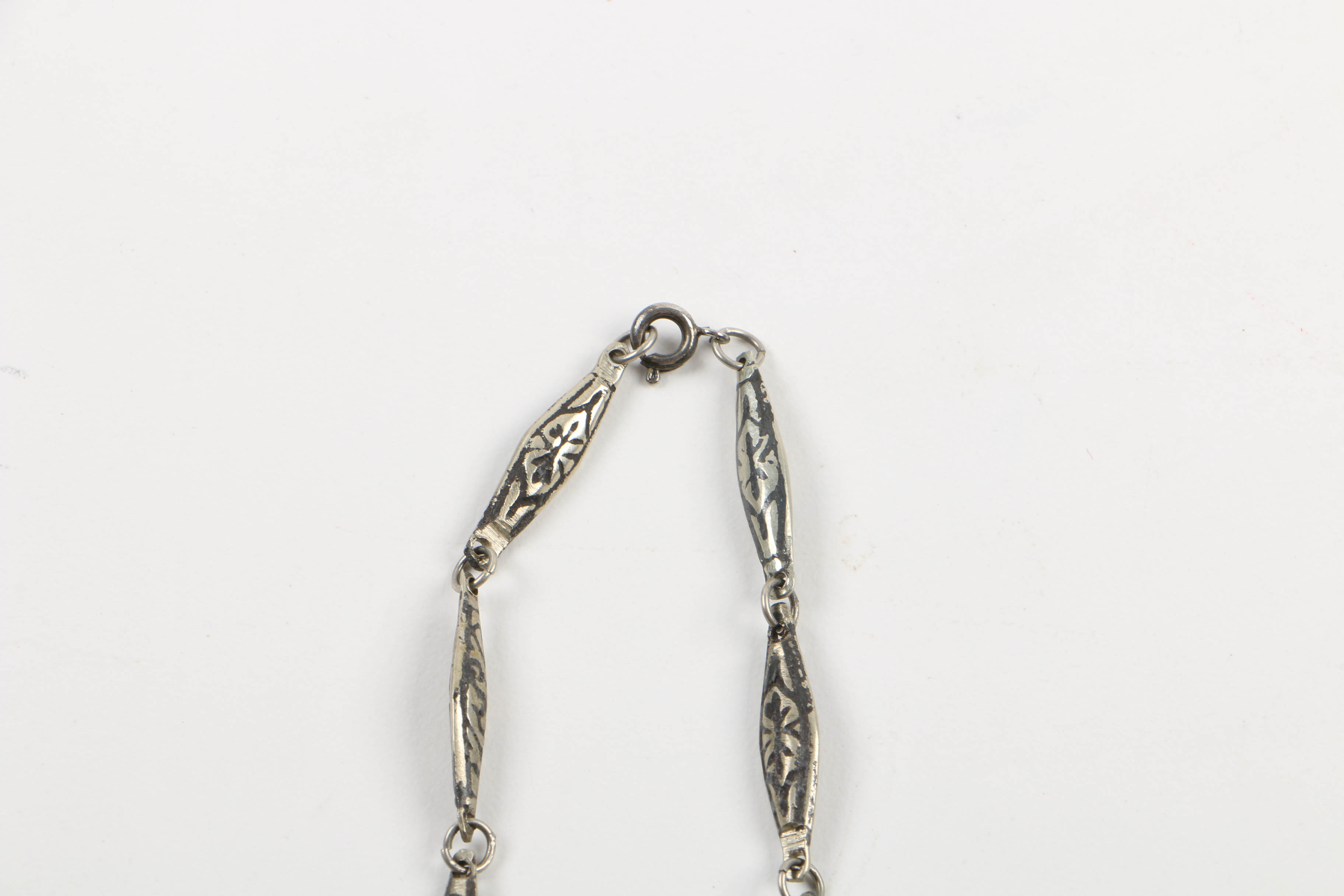 Grouping of Jewelry Including Necklace with Bronze Bull