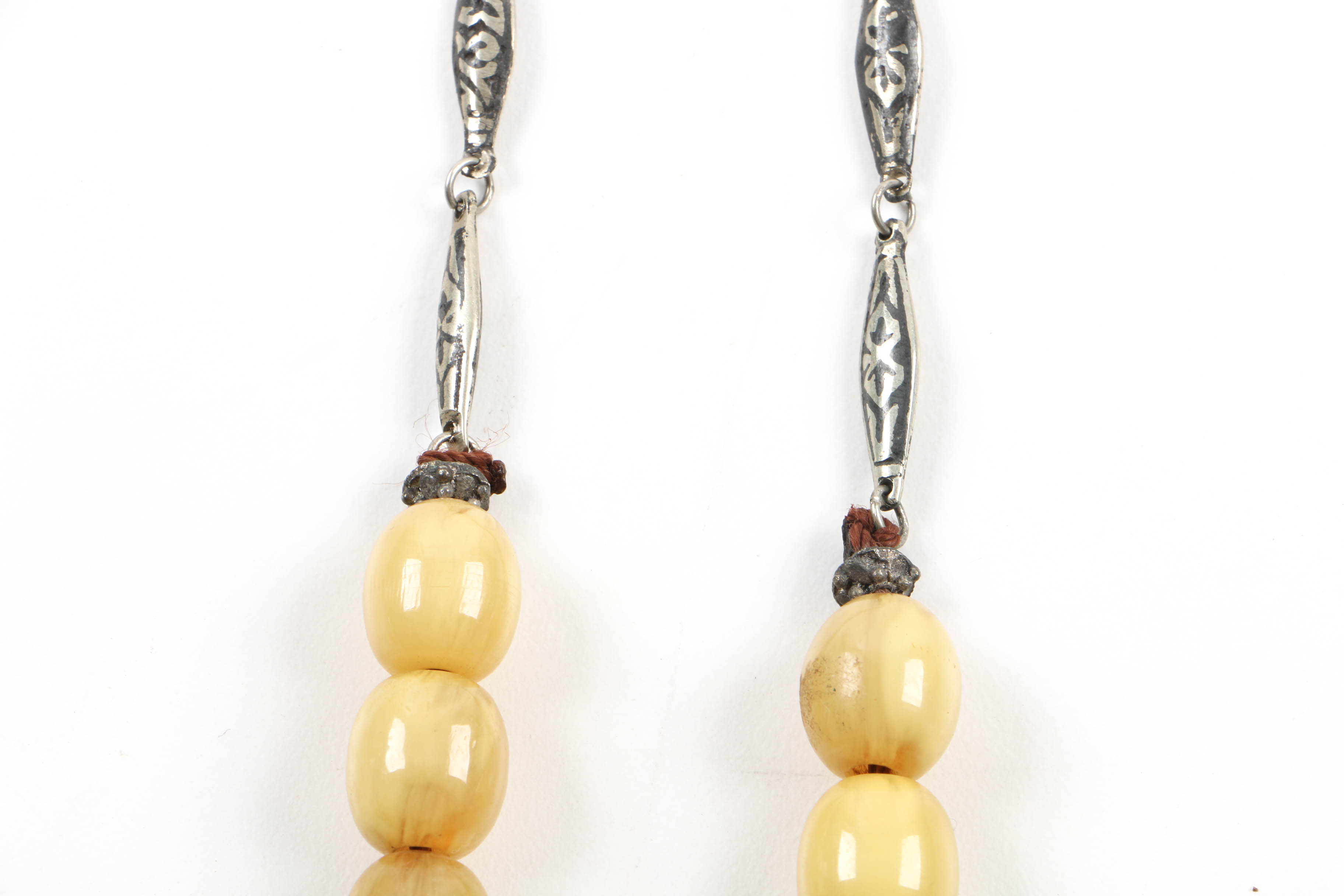 Grouping of Jewelry Including Necklace with Bronze Bull