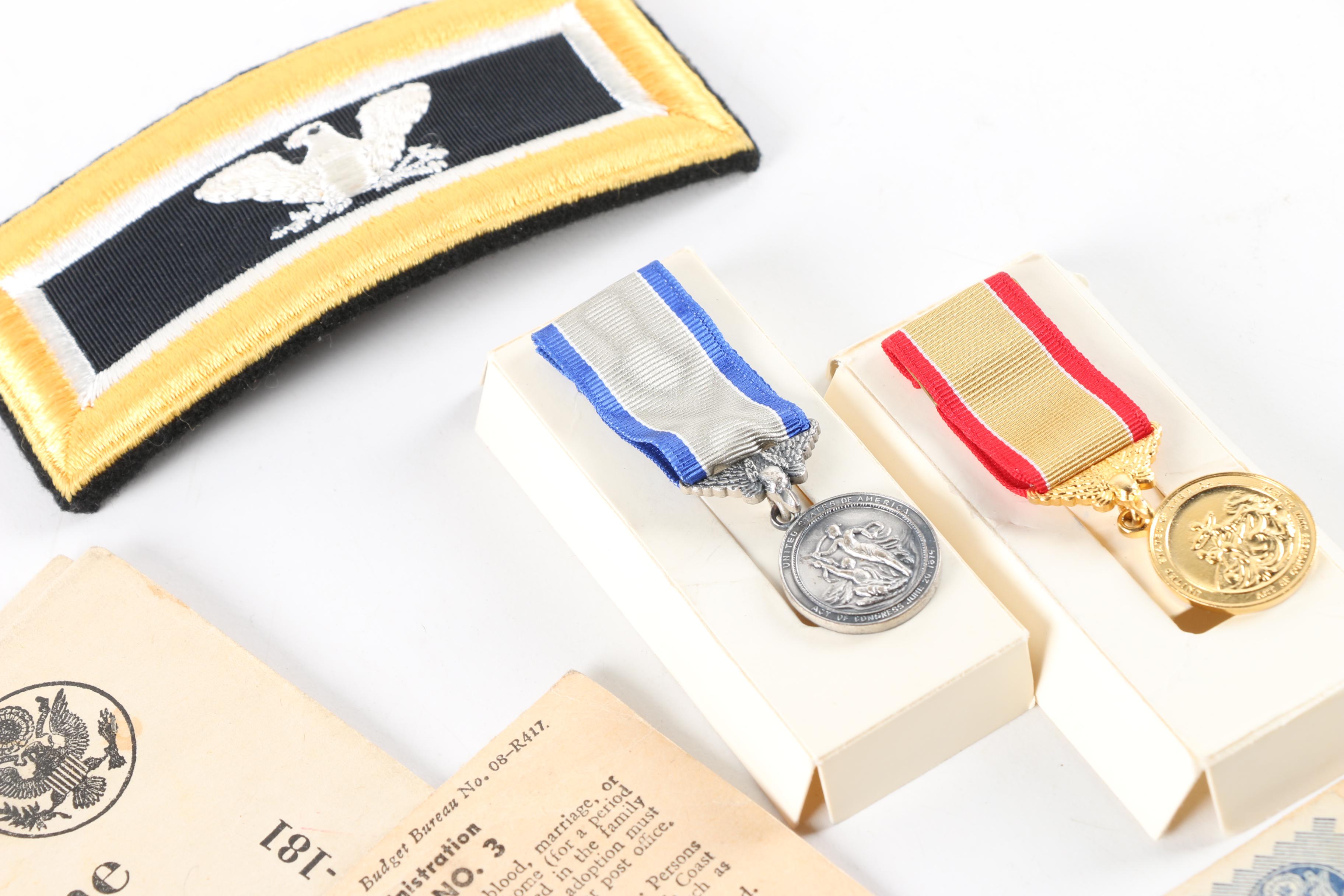 World War II Era War Ration Books with Medals, Patches, and Pins