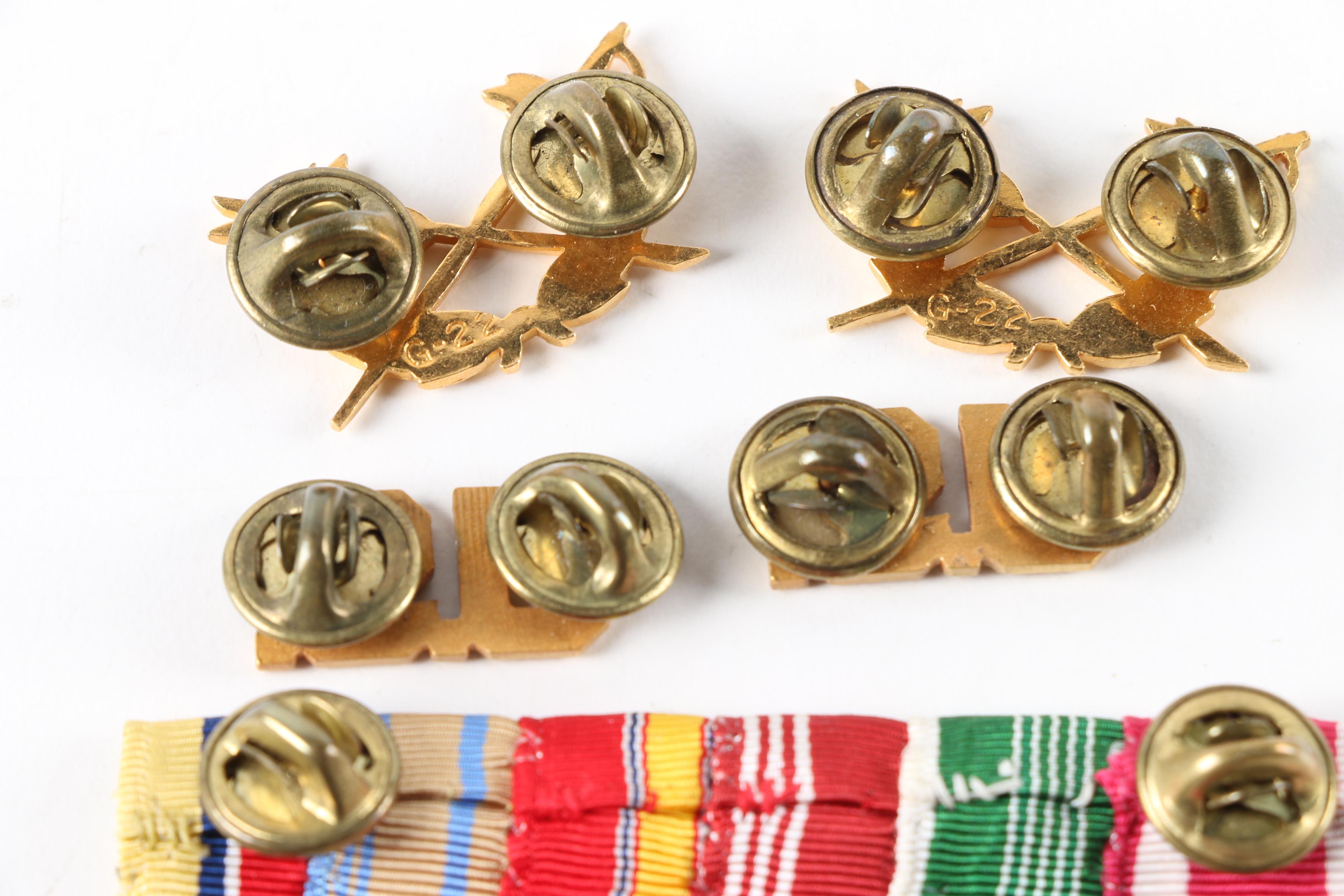 World War II Era War Ration Books with Medals, Patches, and Pins