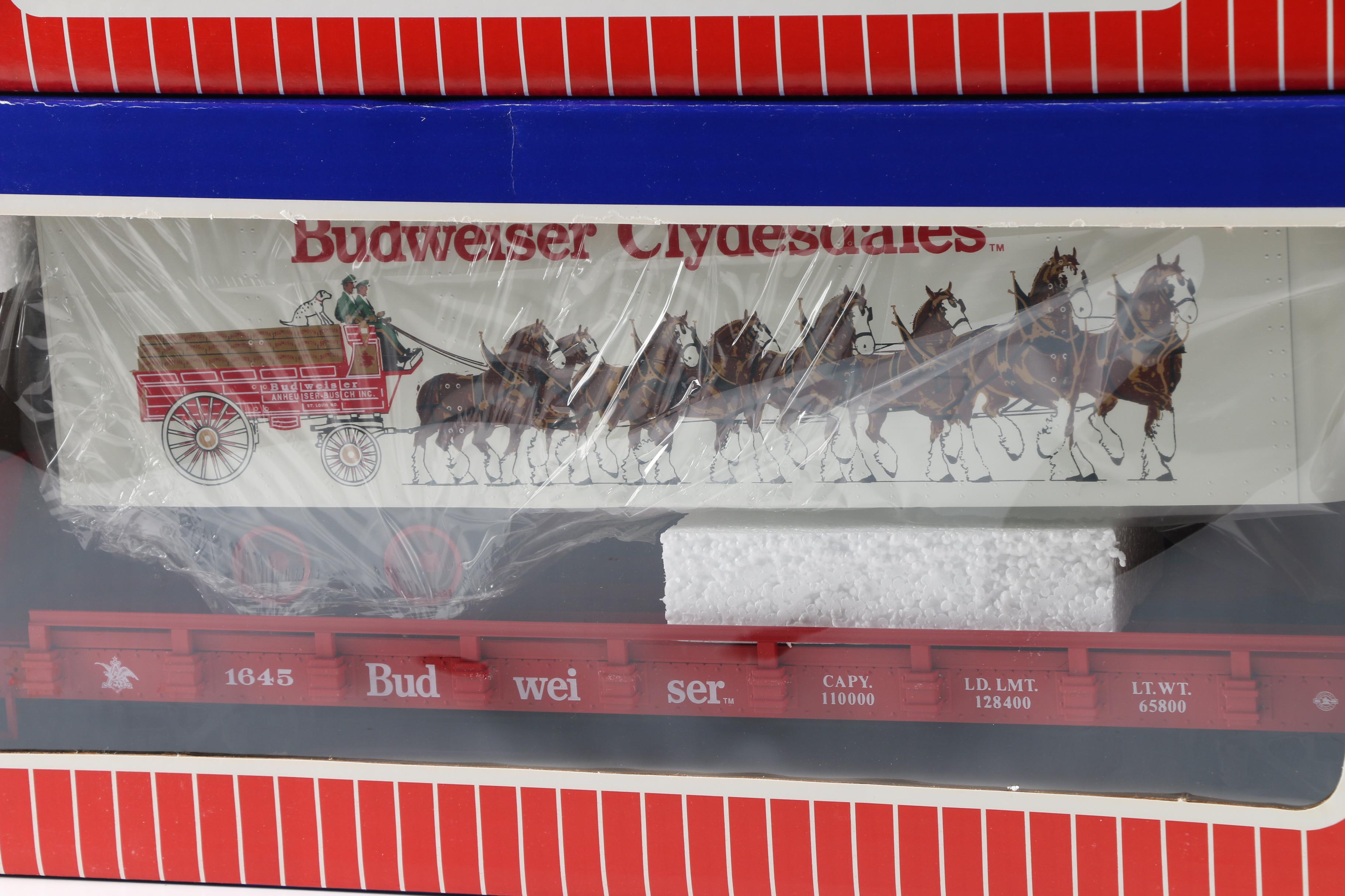 Coca-Cola, RCA Victor, and Budweiser Train Cars