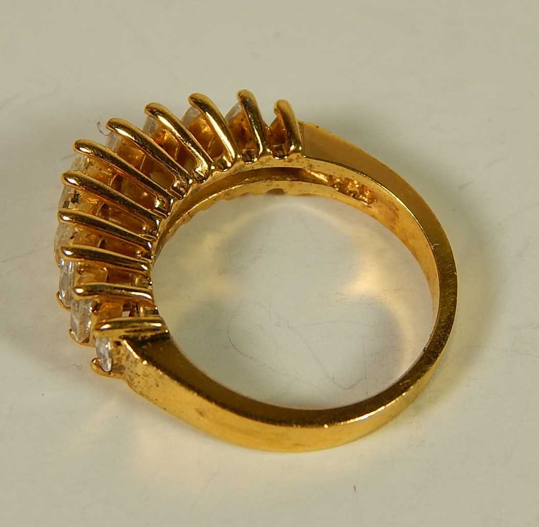 Four Sterling Silver Gold-Tone Rings with Stones