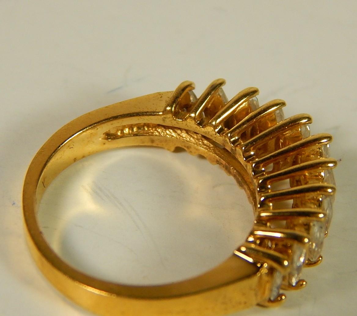 Four Sterling Silver Gold-Tone Rings with Stones