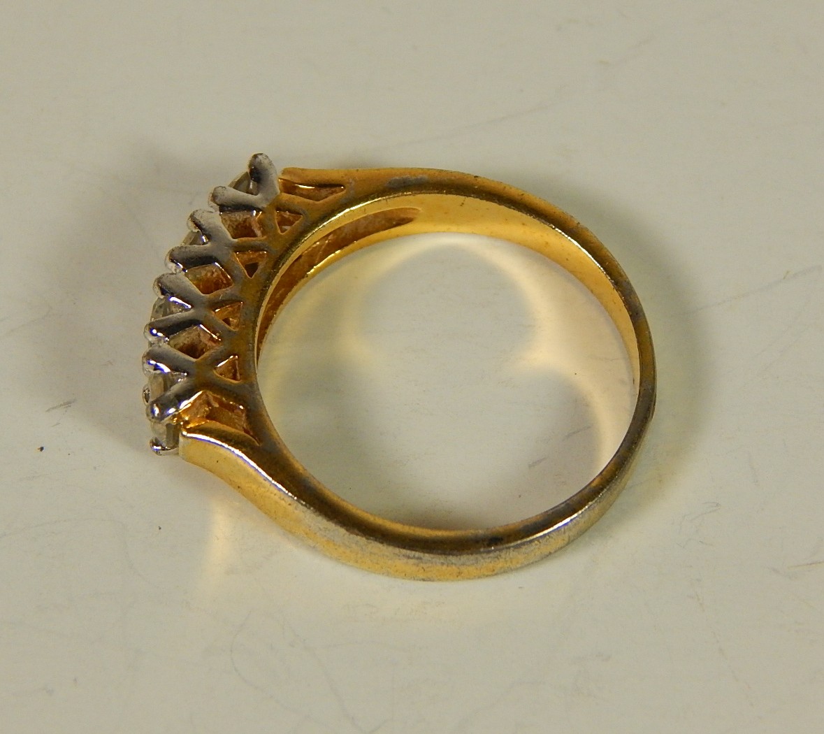 Four Sterling Silver Gold-Tone Rings with Stones