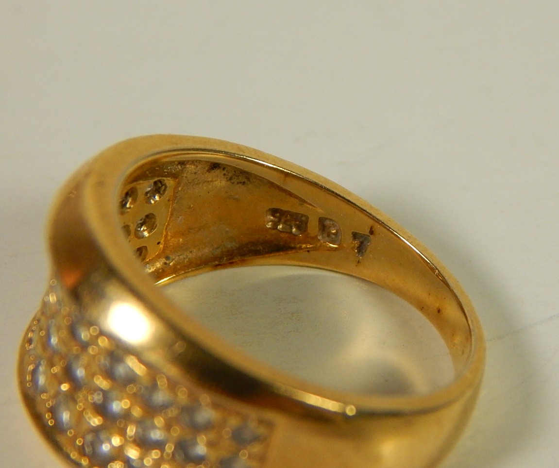 Four Sterling Silver Gold-Tone Rings with Stones