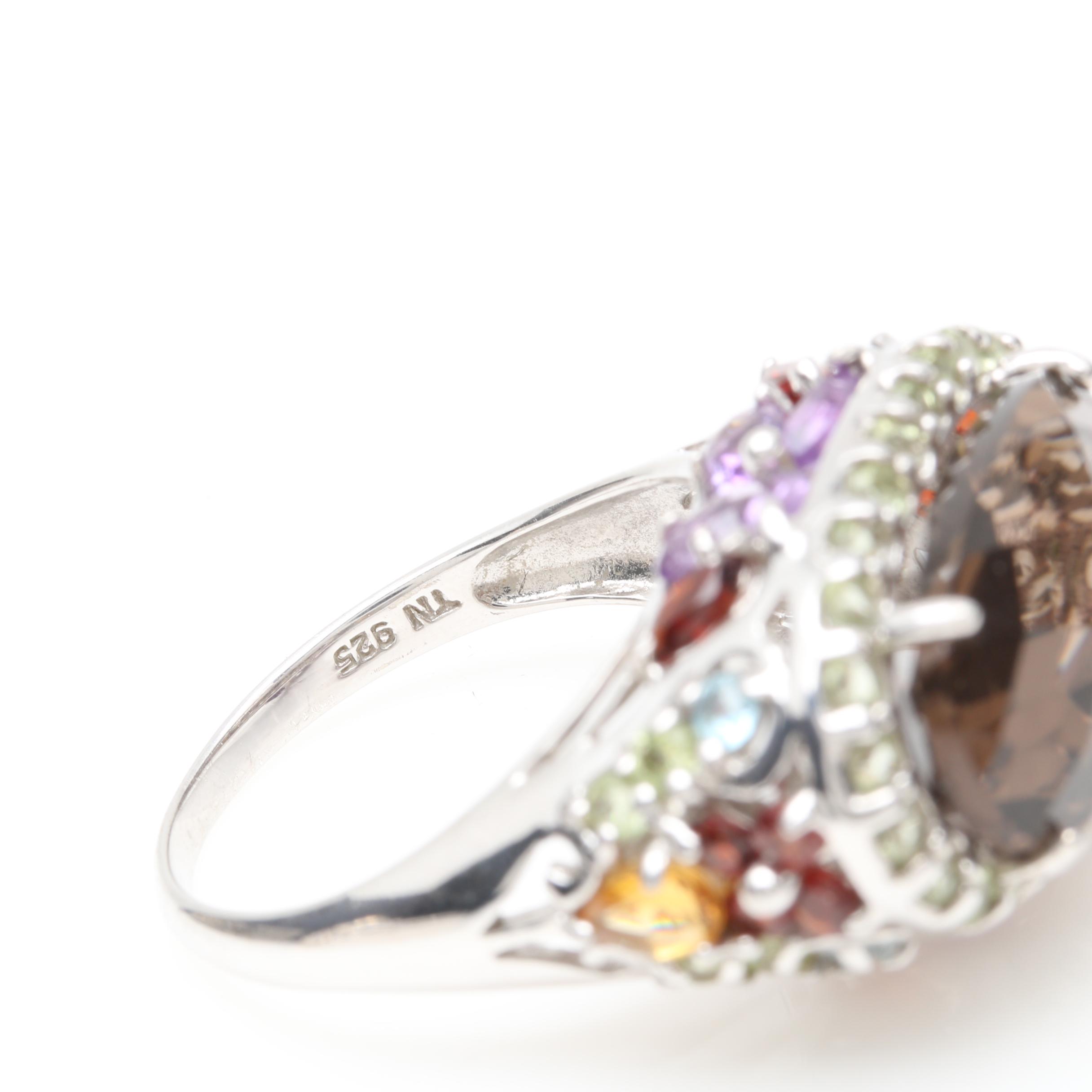 Silver Tone Bracelet and Sterling Silver Rings Including Garnet and Peridot