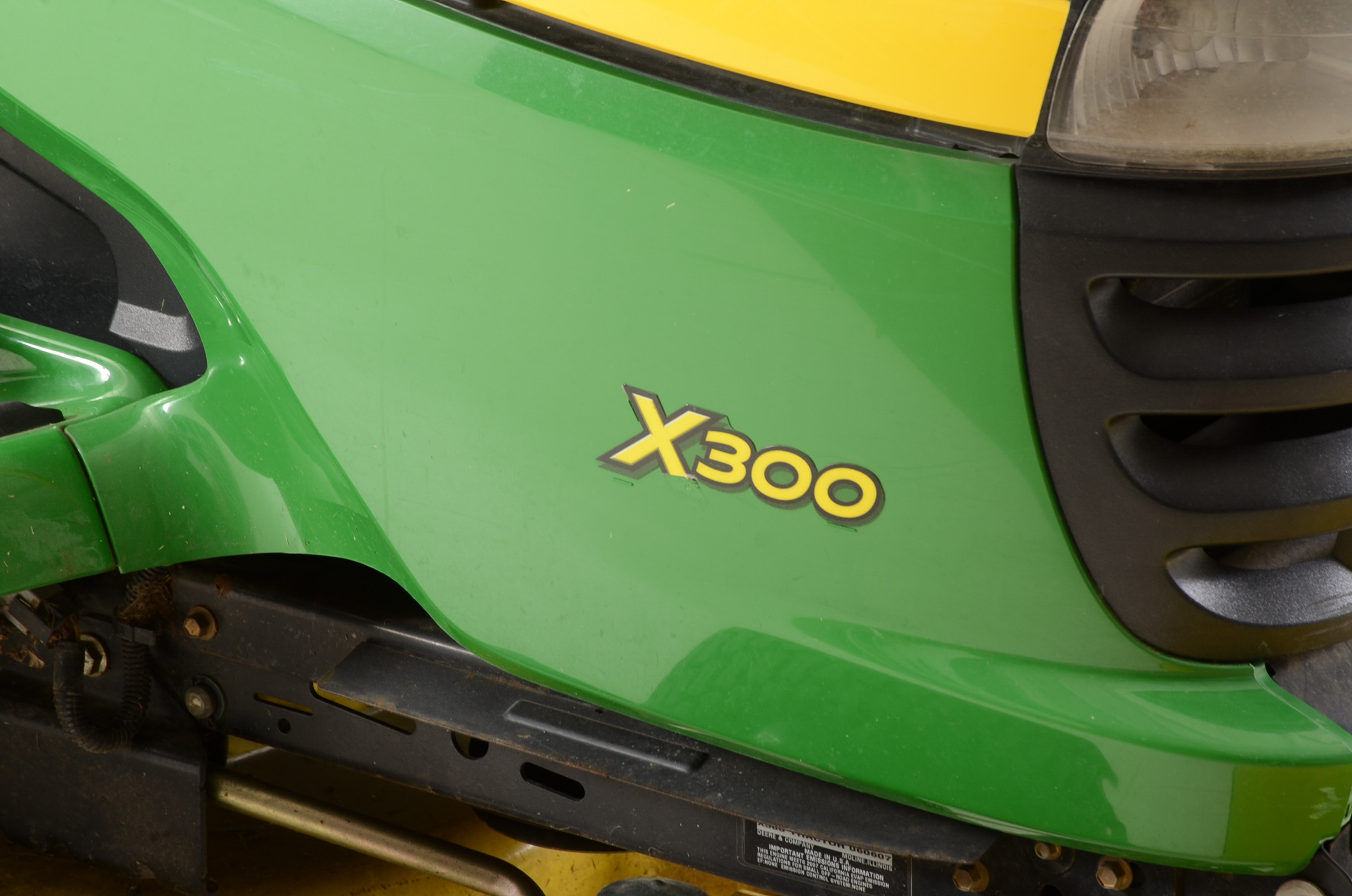 2010 John Deere Select Series X300 Riding Lawn Tractor with Snow Blade and Wagon