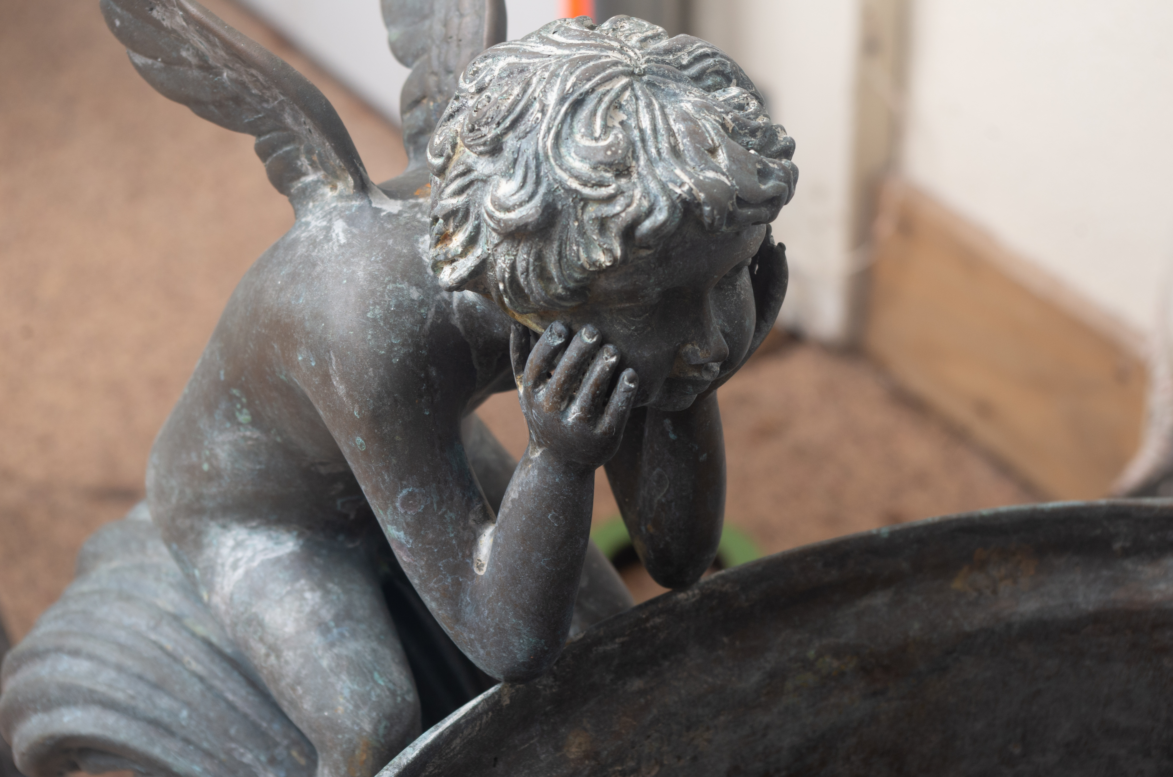 Pair of Rococo Style Putti Decorated Bronze-Tone Metal Urn Planters