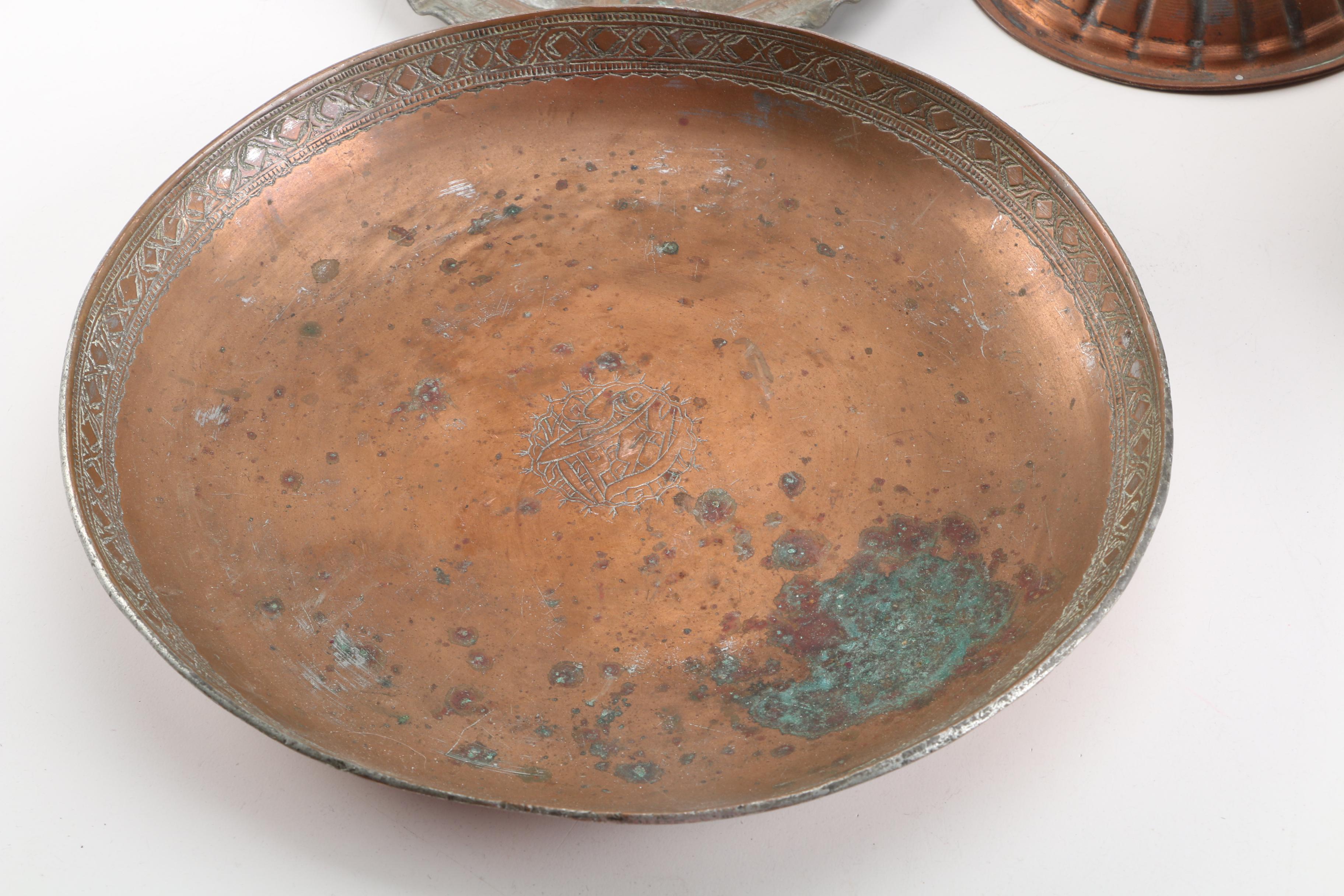 Grouping of Copper Plates, Bowls and Candleholder