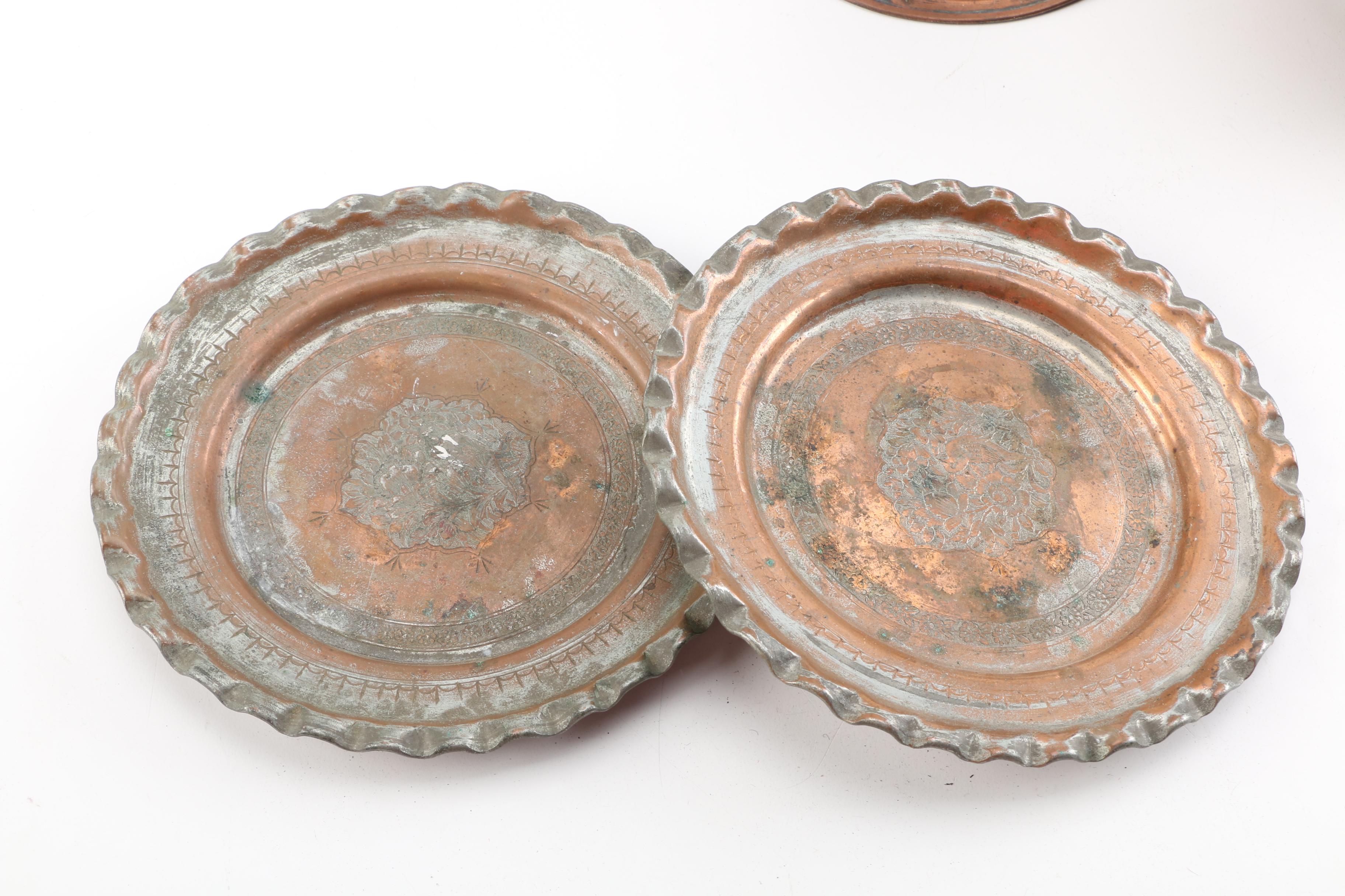 Grouping of Copper Plates, Bowls and Candleholder