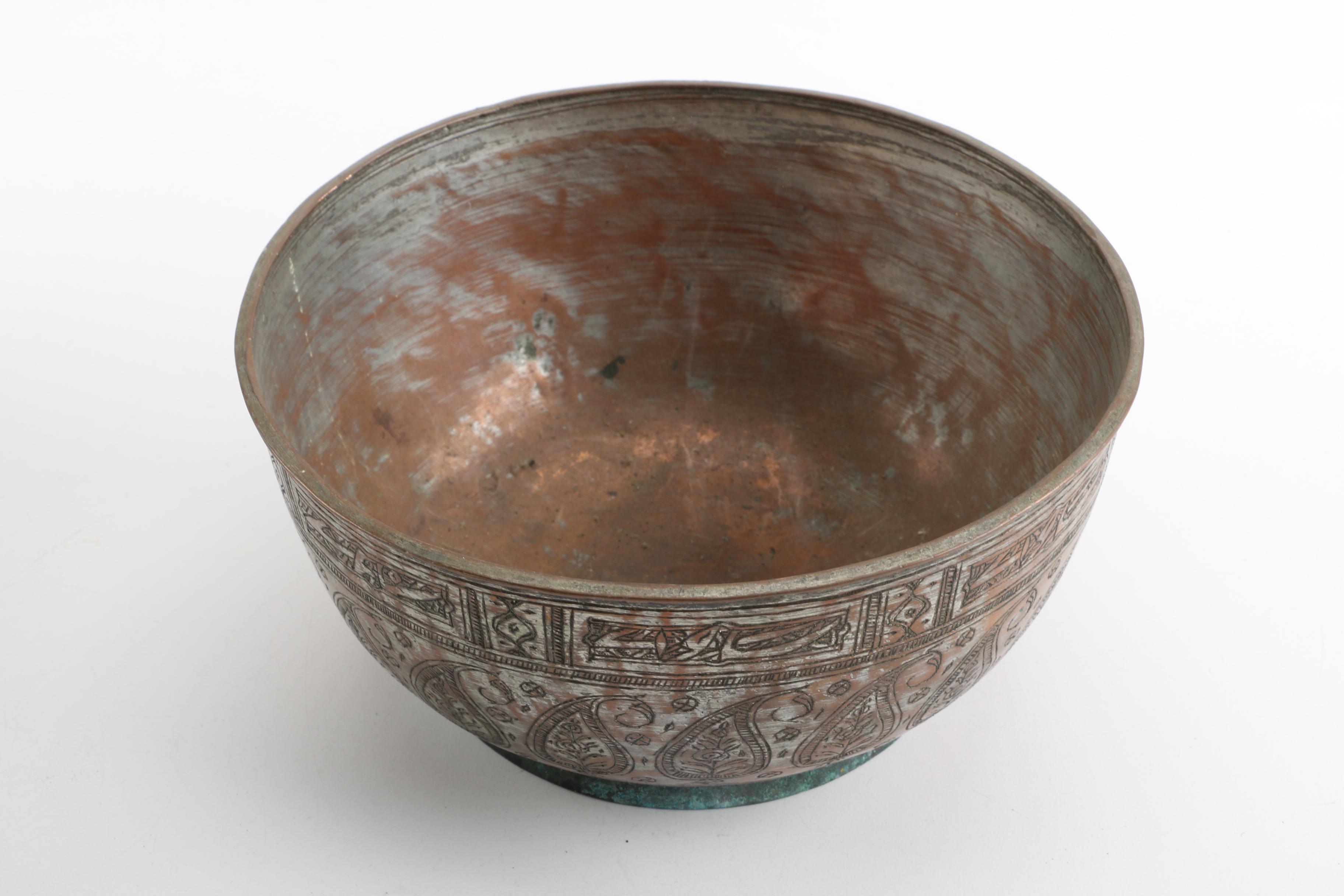 Grouping of Copper Plates, Bowls and Candleholder