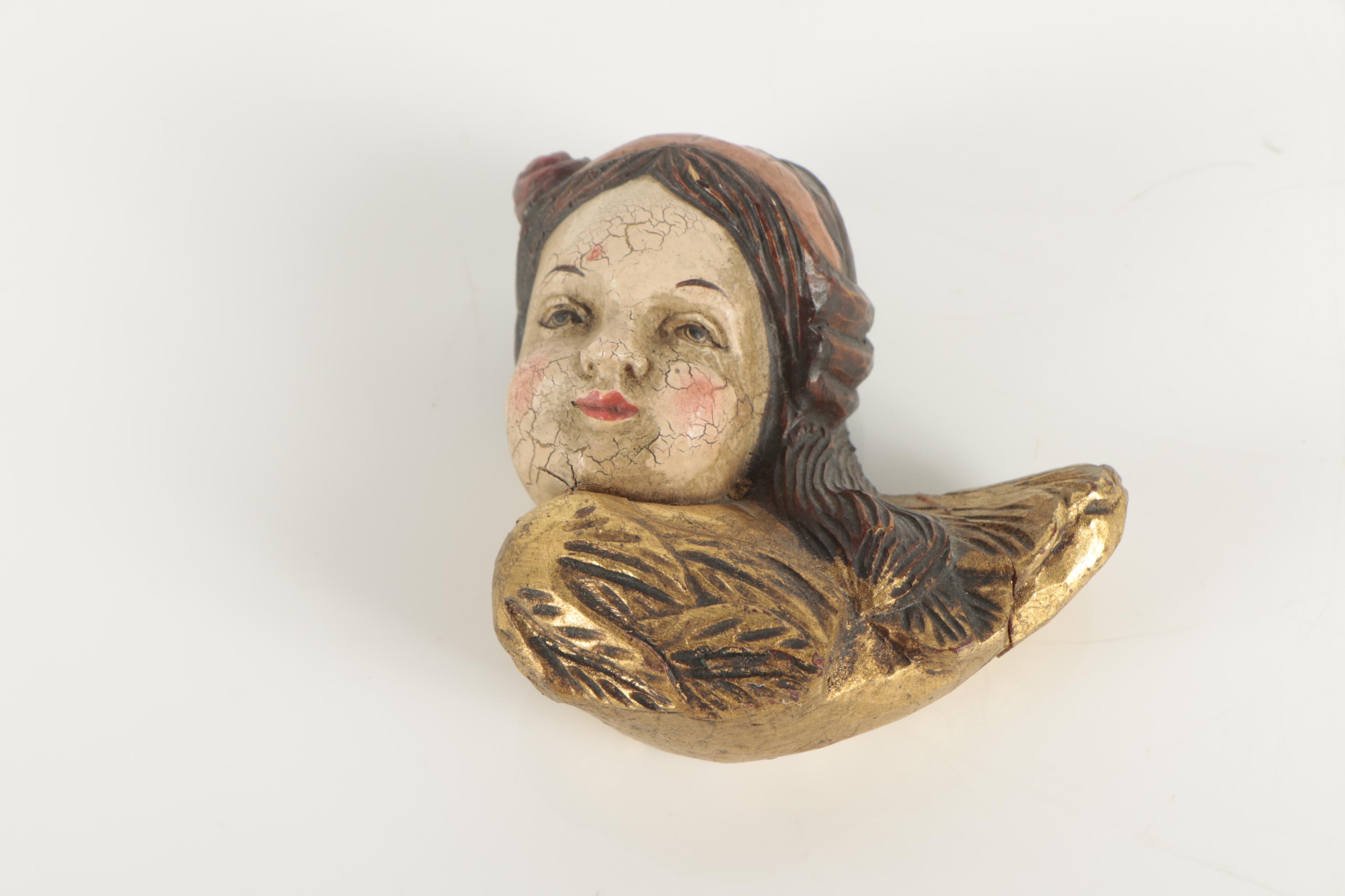 Carved Wood Angel Faces