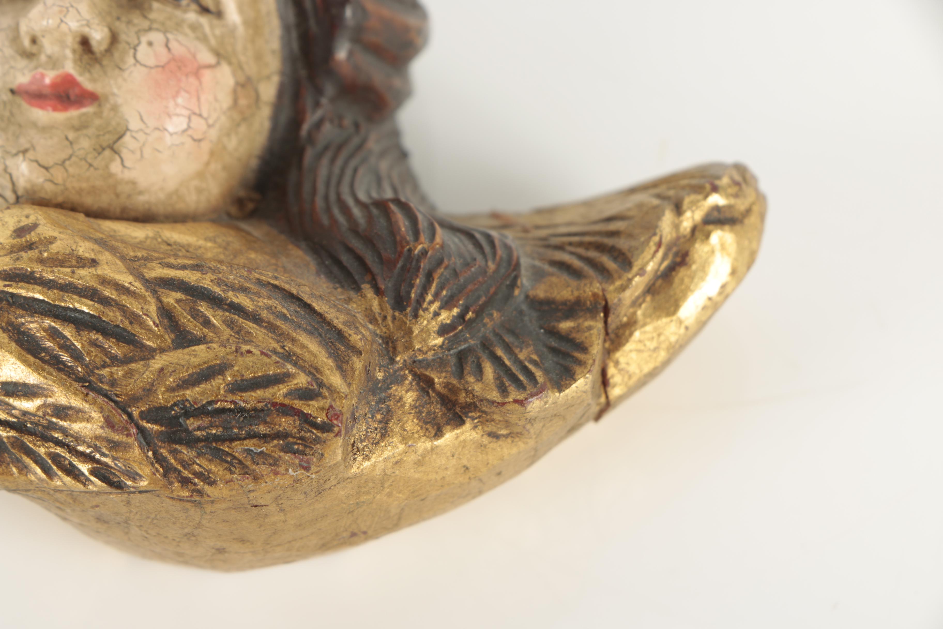 Carved Wood Angel Faces