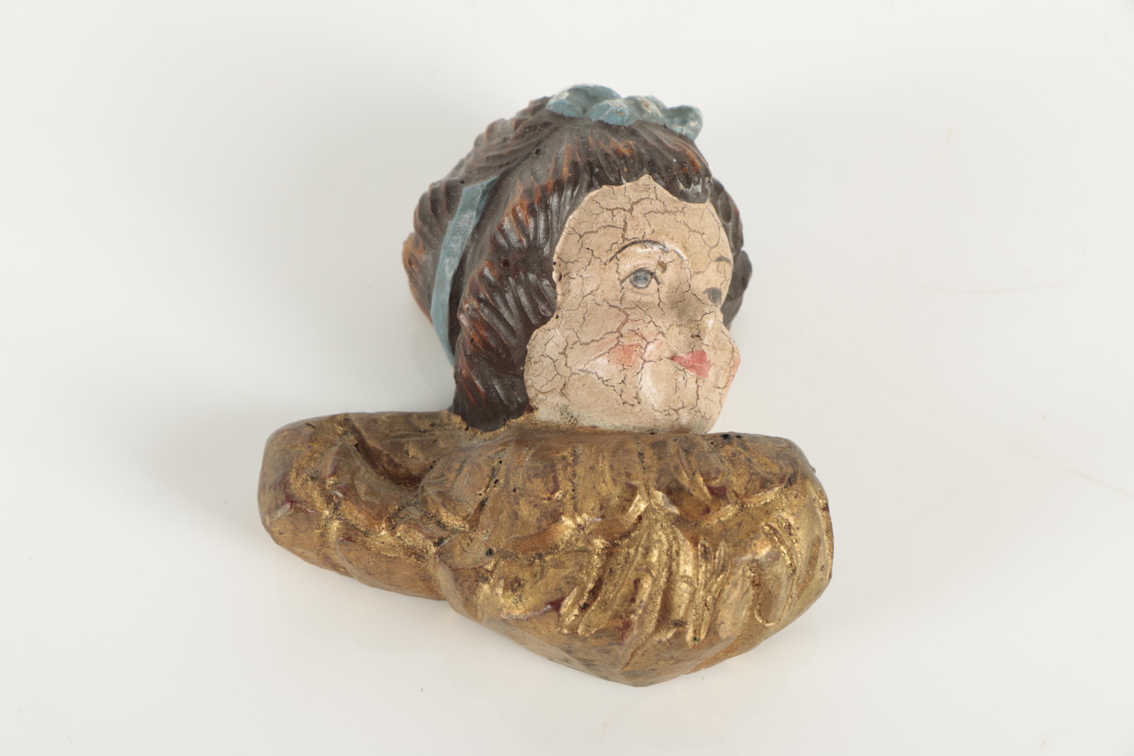 Carved Wood Angel Faces