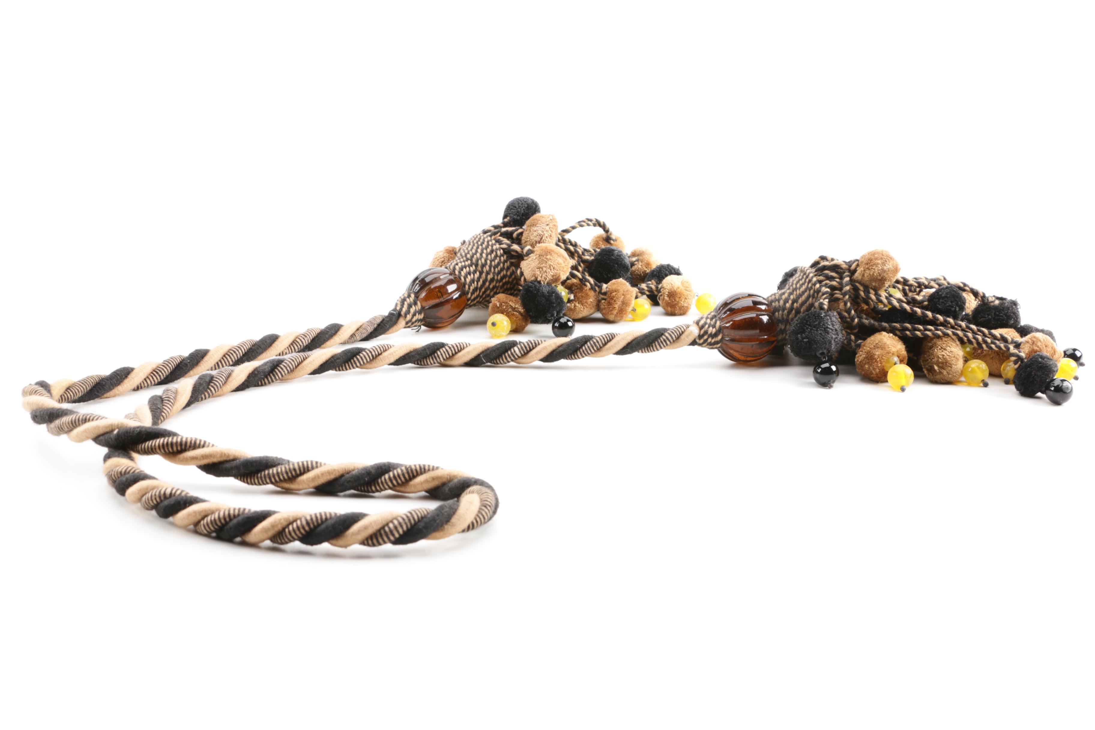 Metal Cross Figure with Tassels