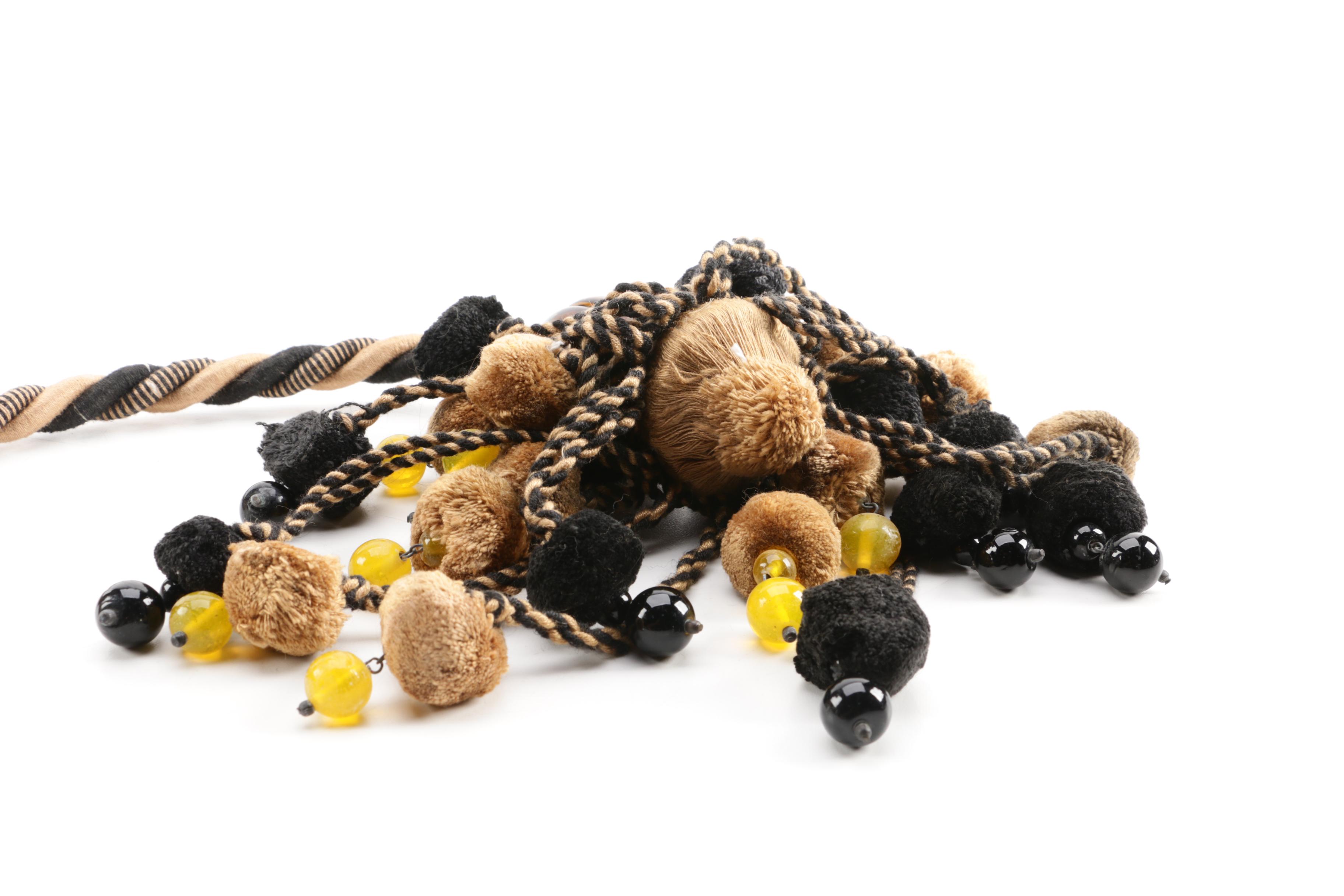 Metal Cross Figure with Tassels