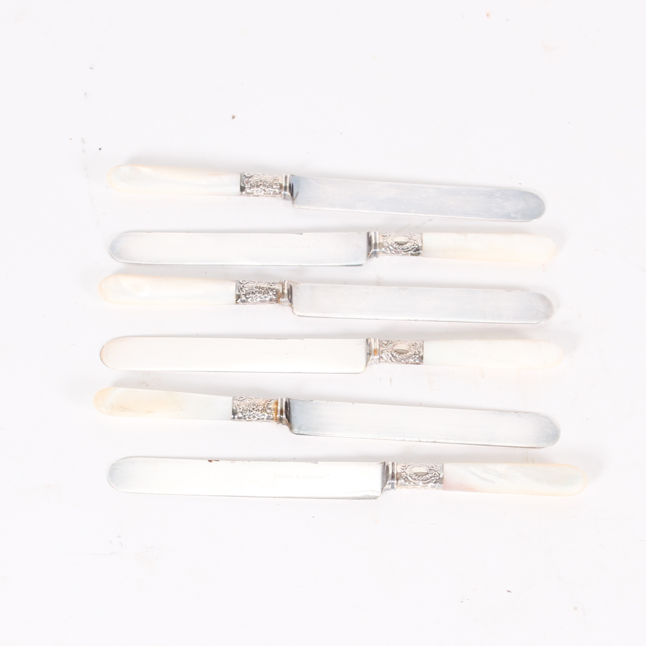 Holmes & Edwards Mother-of-Pearl Handle and Sterling Silver Bolster Knives