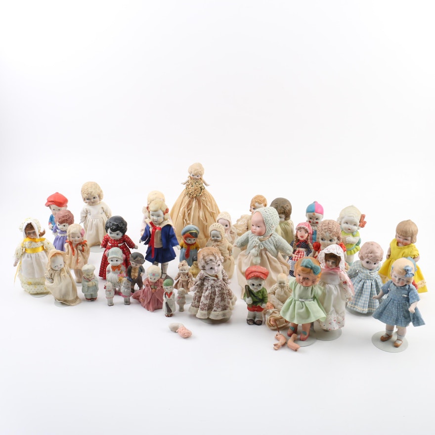 Semi-Antique "Frozen Charlotte" and "Kewpie" Miniature Bisque Dolls