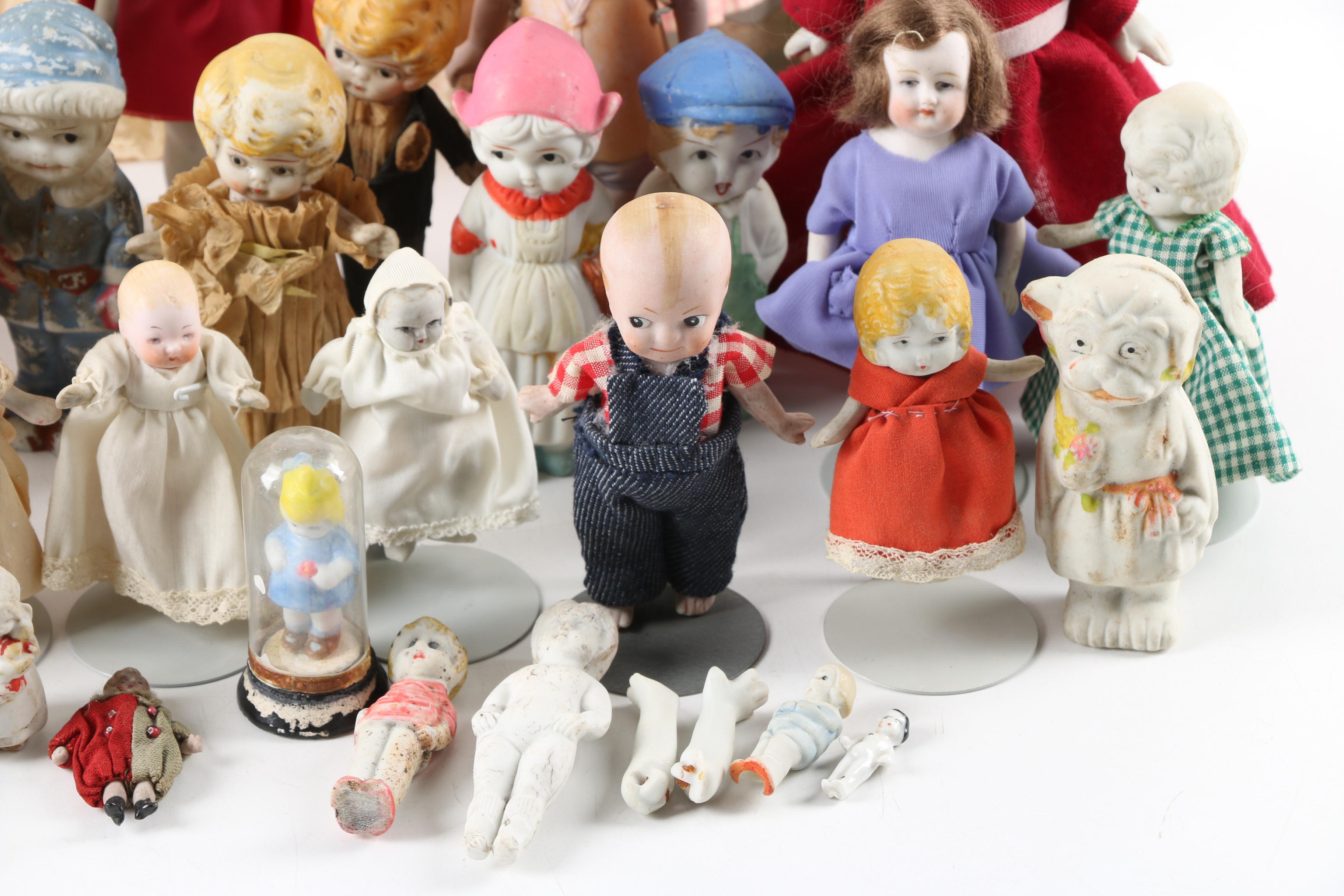 Semi-Antique "Frozen Charlotte" and "Kewpie" Miniature Bisque Dolls