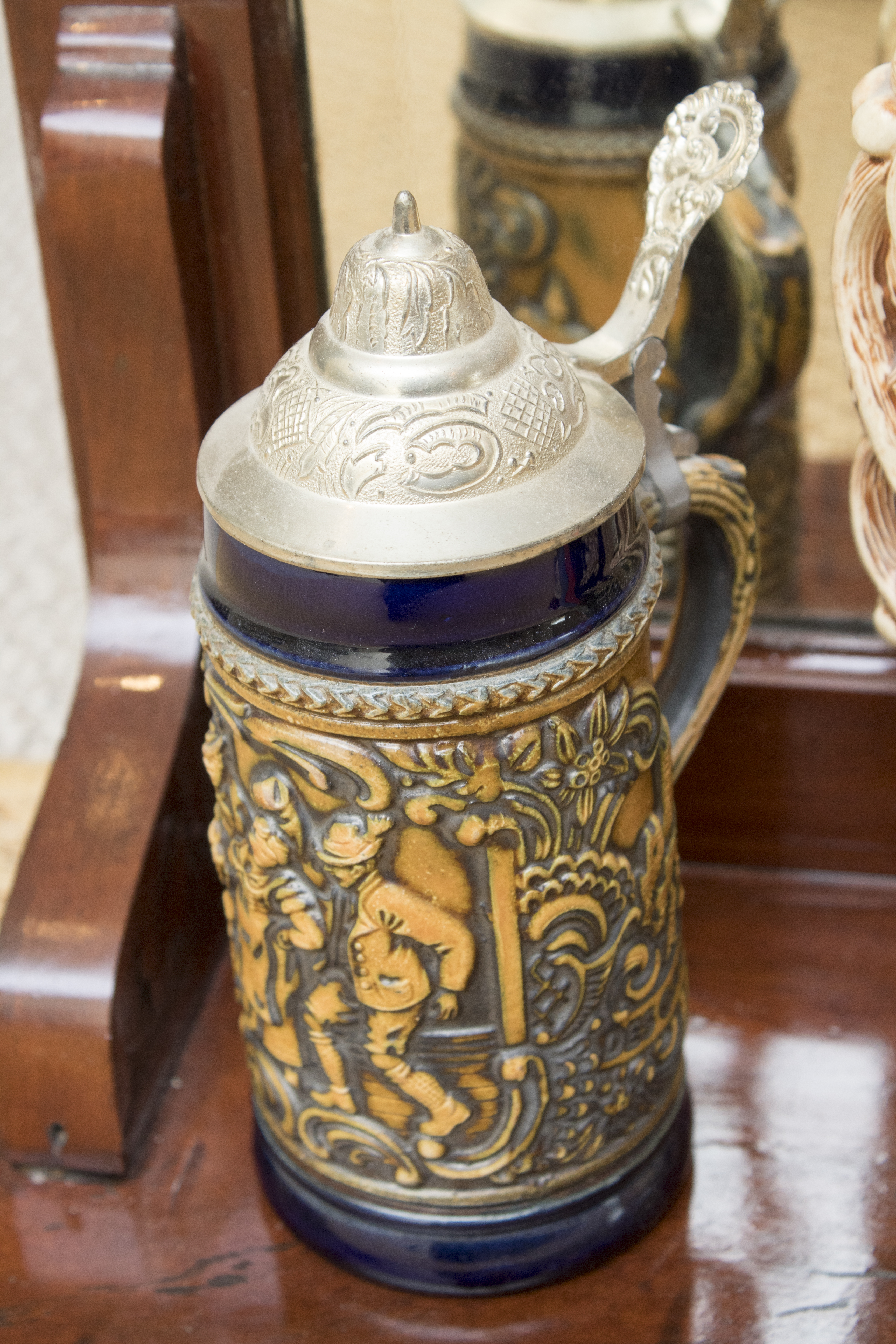 German Beer Steins Featuring Gerz and a Vintage Ledge Mirror