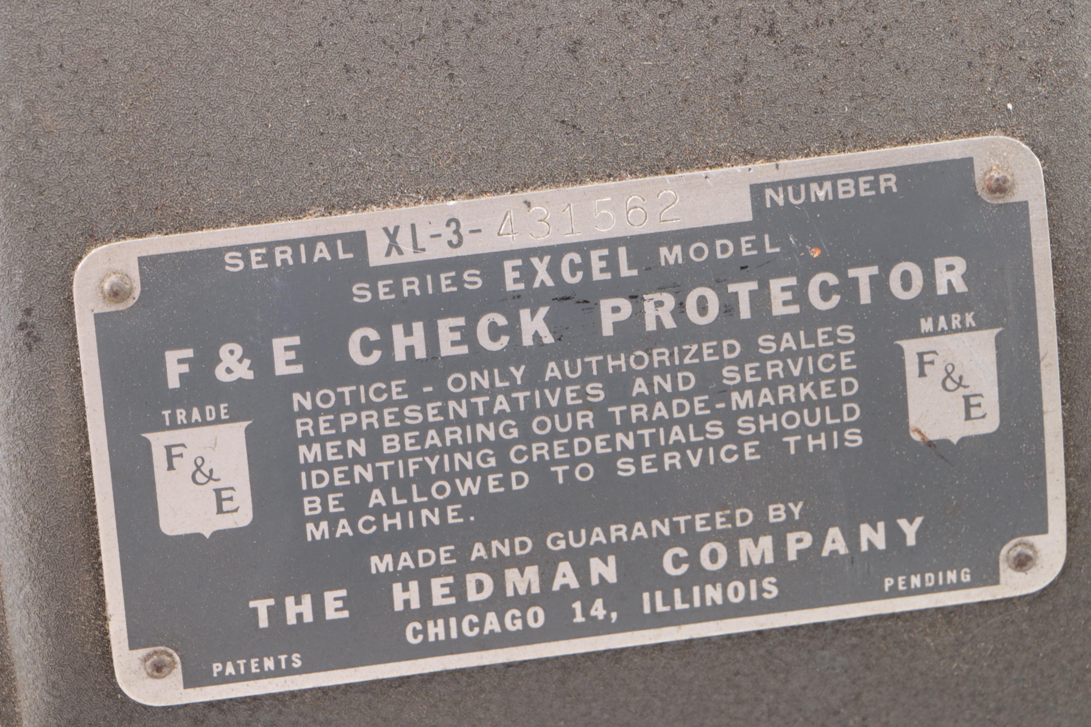 Hedman Check Protector and Remington Rand Adding Machine